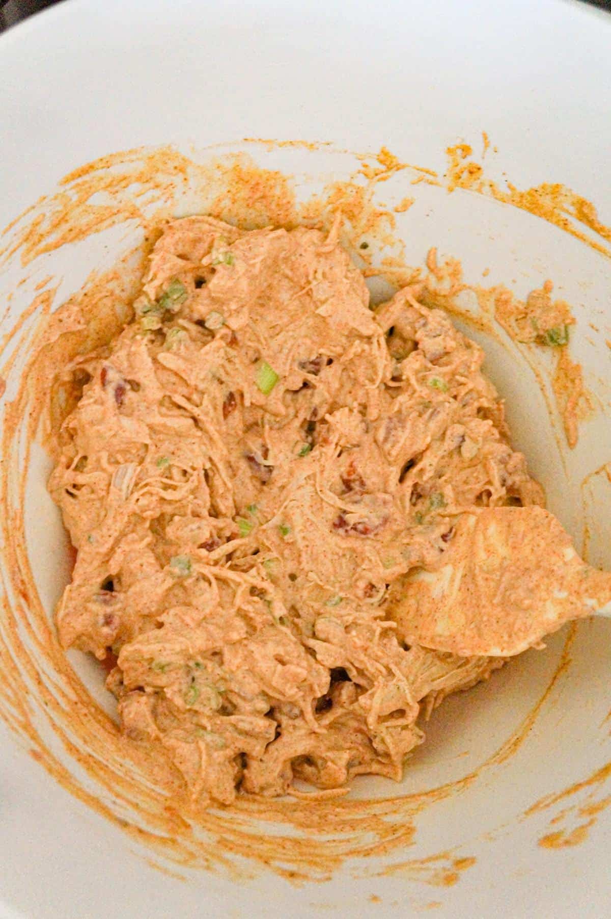 chicken, sour cream and rotel mixture in a mixing bowl