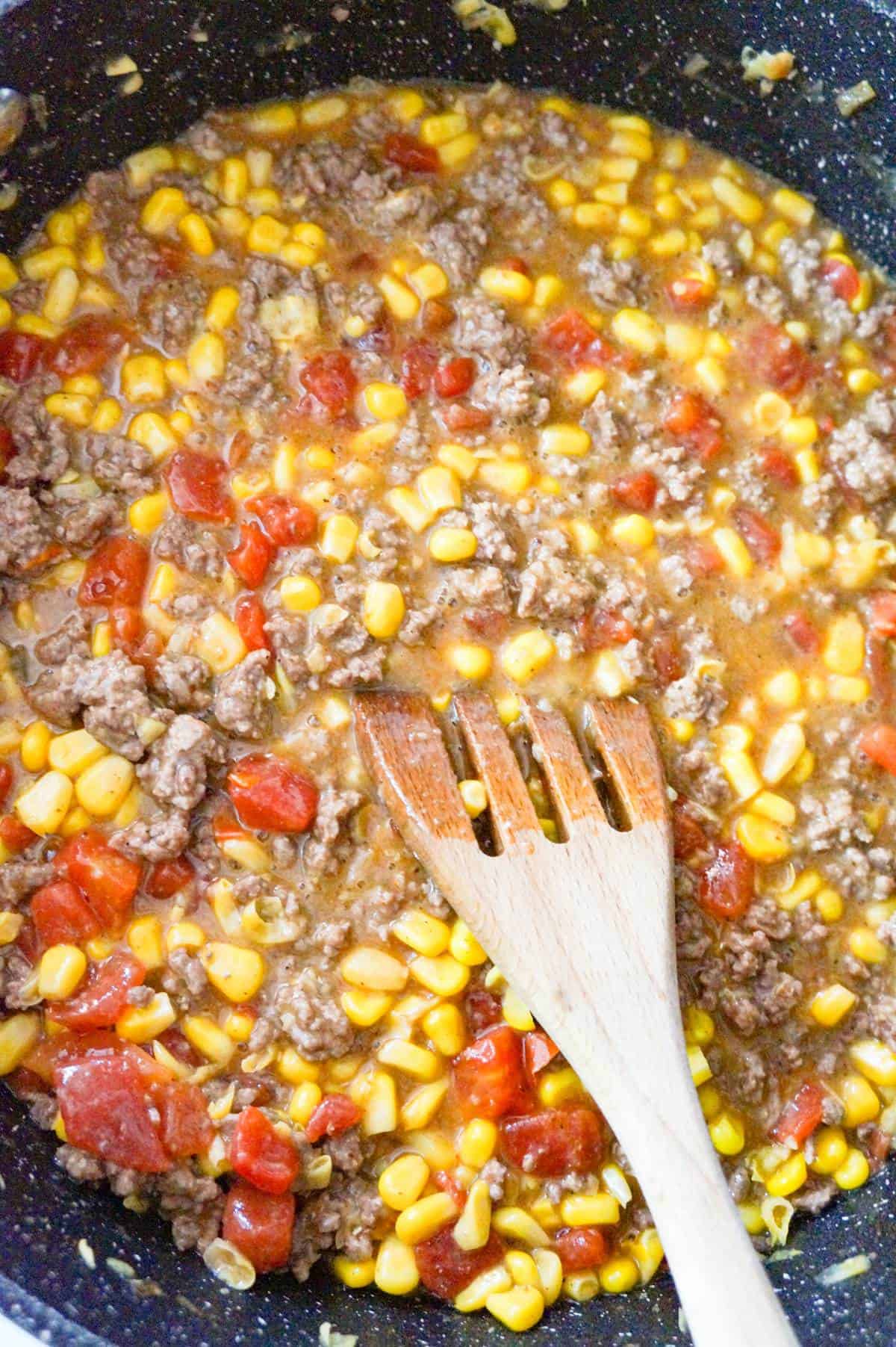 ground beef, corn and rotel mixture in a baking dish
