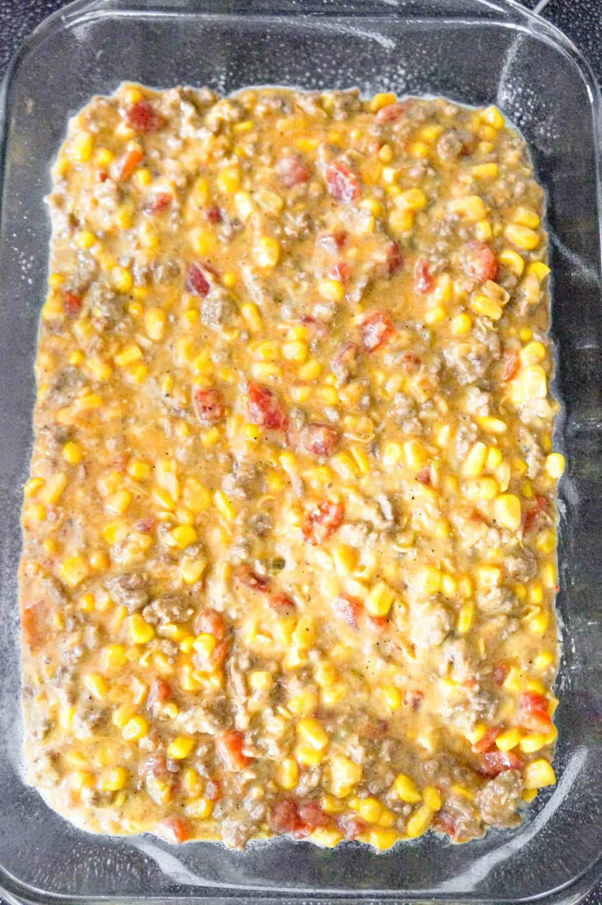 cheesy ground beef mixture in a baking dish