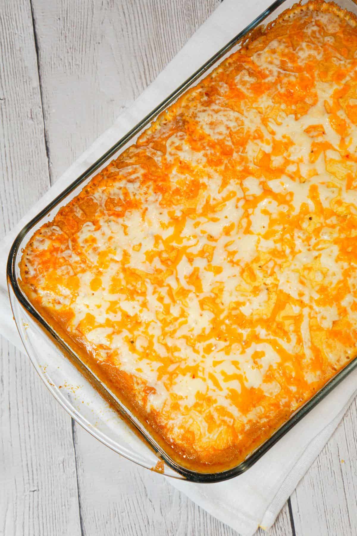 Mexican Cornbread Casserole is an easy ground beef dinner recipe loaded with corn, Rotel diced tomatoes and green chilies, taco seasoning and shredded cheese all topped with Jiffy cornbread.