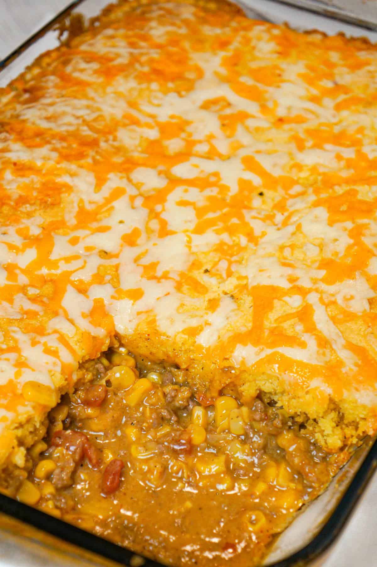 Mexican Cornbread Casserole is an easy ground beef dinner recipe loaded with corn, Rotel diced tomatoes and green chilies, taco seasoning and shredded cheese all topped with Jiffy cornbread.