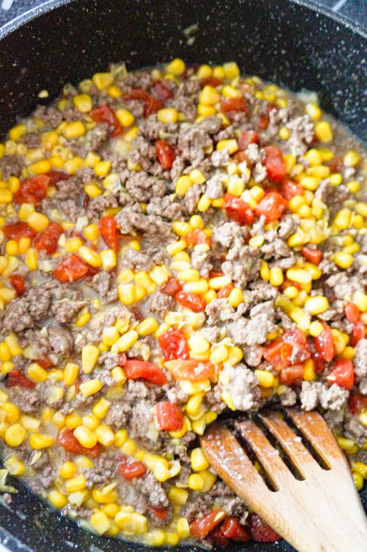 ground beef, corn and rotel mixture in a saute pan