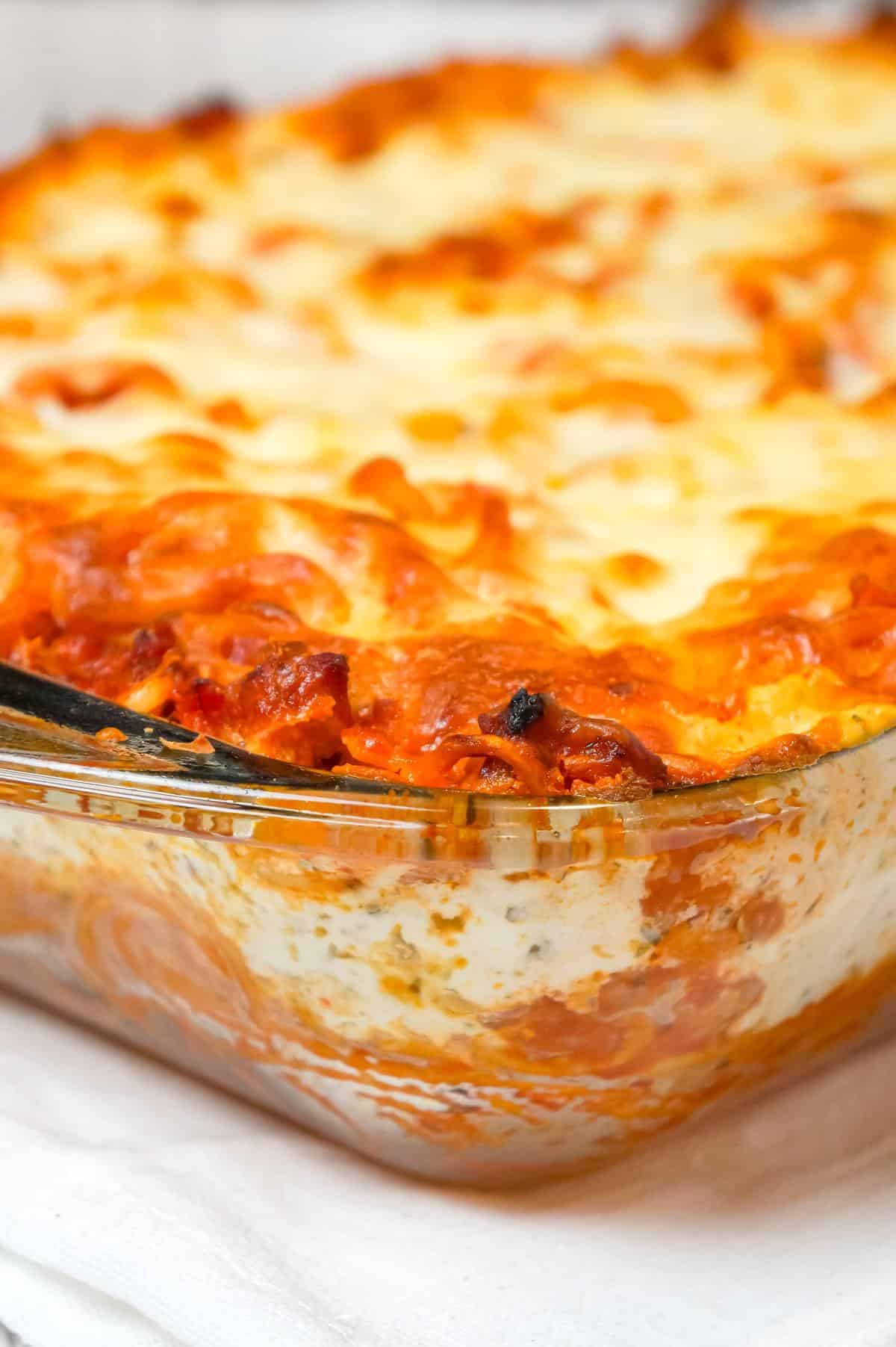 Million Dollar Spaghetti is a delicious baked spaghetti recipe loaded with Italian sausage, cream cheese, sour cream and a blend of shredded Italian cheeses.