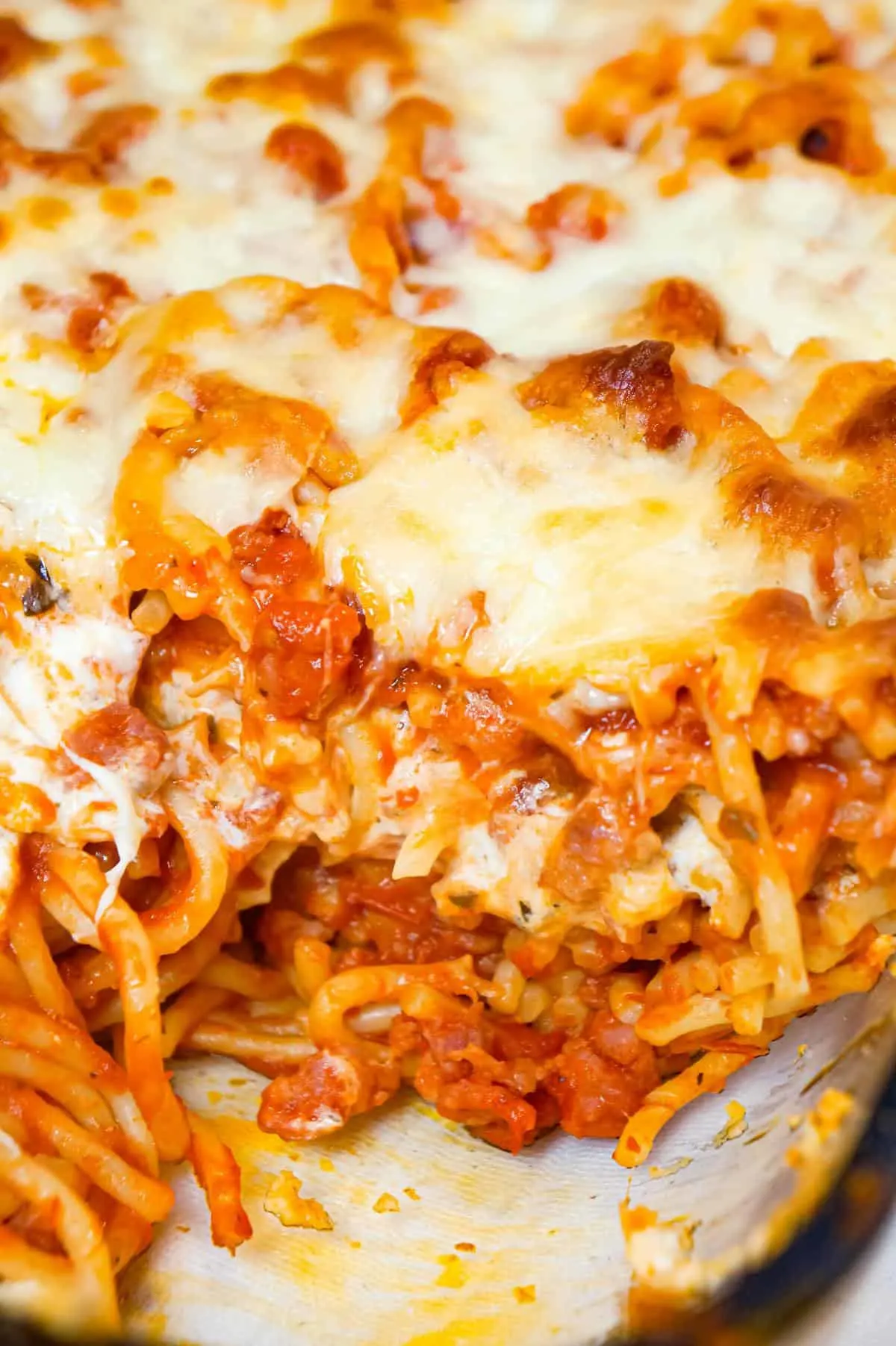 Million Dollar Spaghetti is a delicious baked spaghetti recipe loaded with Italian sausage, cream cheese, sour cream and a blend of shredded Italian cheeses.
