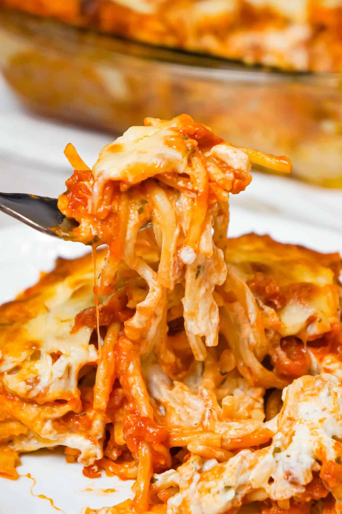 Million Dollar Spaghetti is a delicious baked spaghetti recipe loaded with Italian sausage, cream cheese, sour cream and a blend of shredded Italian cheeses.