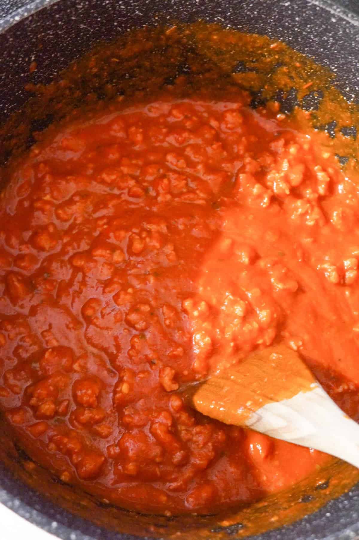 marinara and ground sausage mixture in a large pot