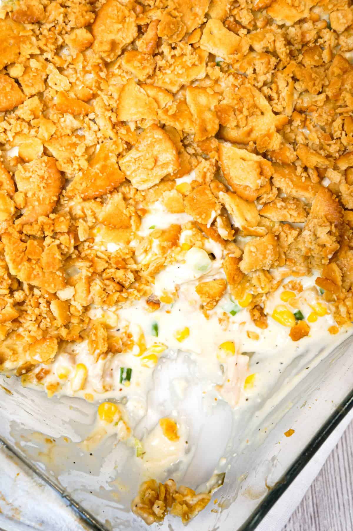 Ritz Chicken Casserole is an easy weeknight dinner recipe using shredded rotisserie chicken, tossed in sour cream and cream of chicken soup and topped with crumbled Ritz crumbs.