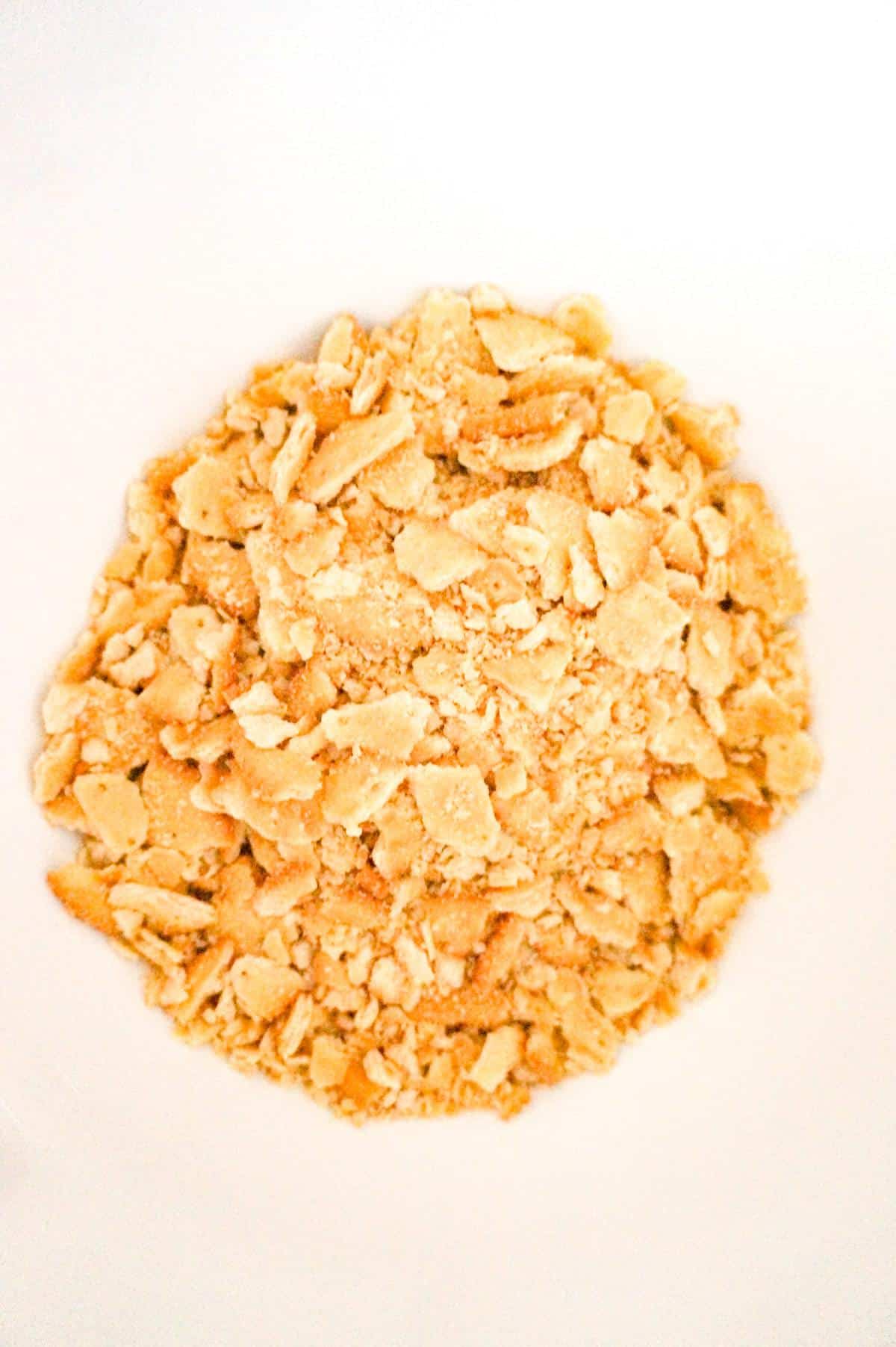 crumbled Ritz crackers in a mixing bowl