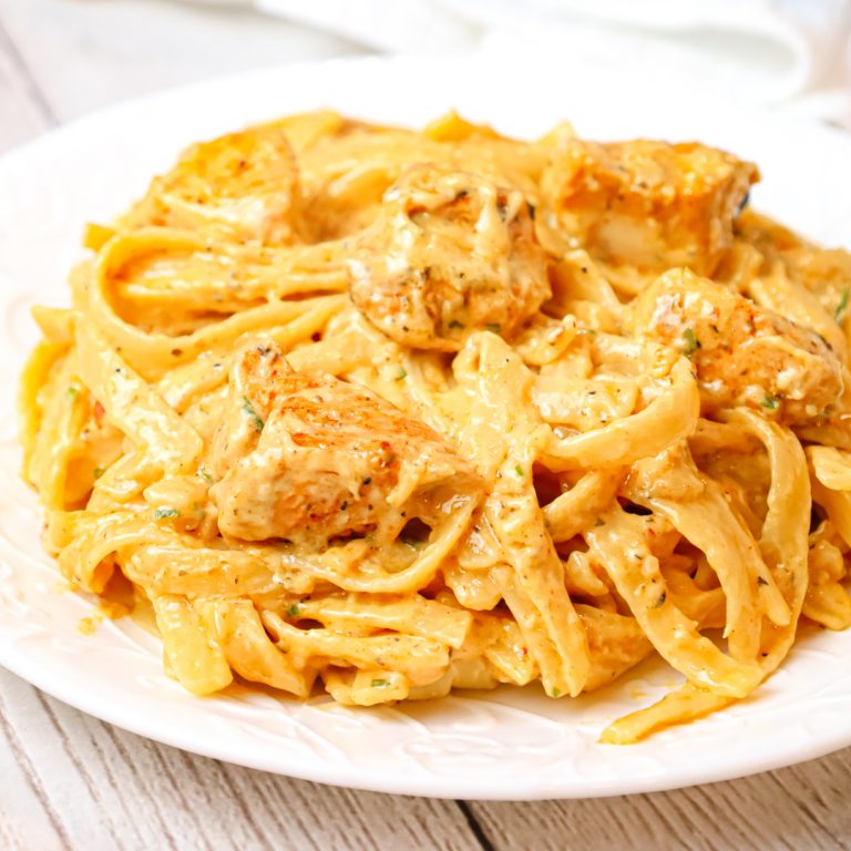 Cajun Chicken Alfredo is a creamy pasta recipe loaded with chunks of chicken breast, Cajun seasoning and parmesan cheese.