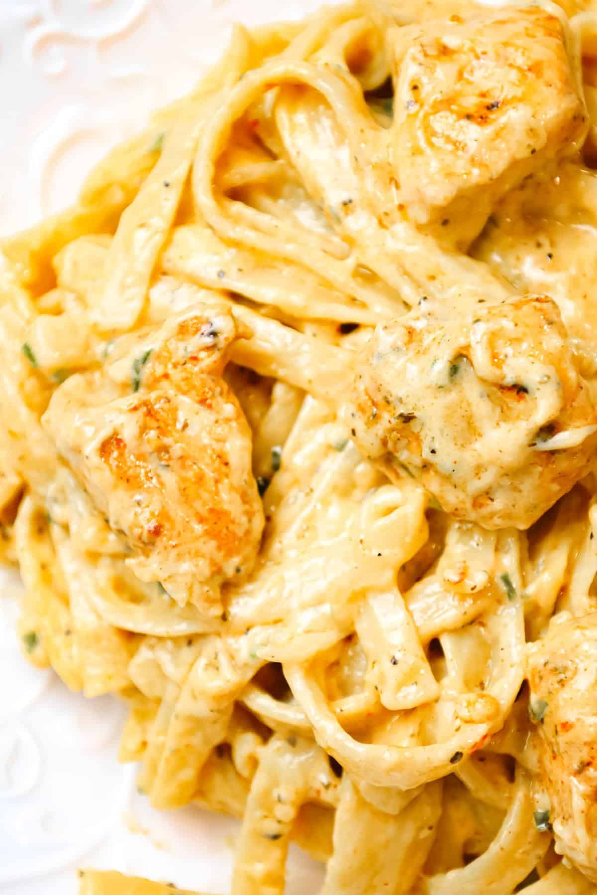 Cajun Chicken Alfredo is a creamy pasta recipe loaded with chunks of chicken breast, Cajun seasoning and parmesan cheese.