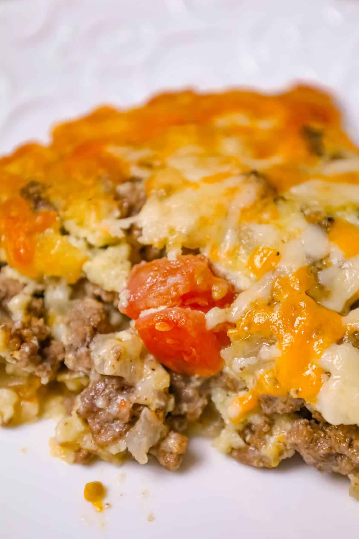 Cheeseburger Pie with Bisquick is an easy ground beef dinner recipe loaded with shredded cheese, diced onions and diced tomatoes.