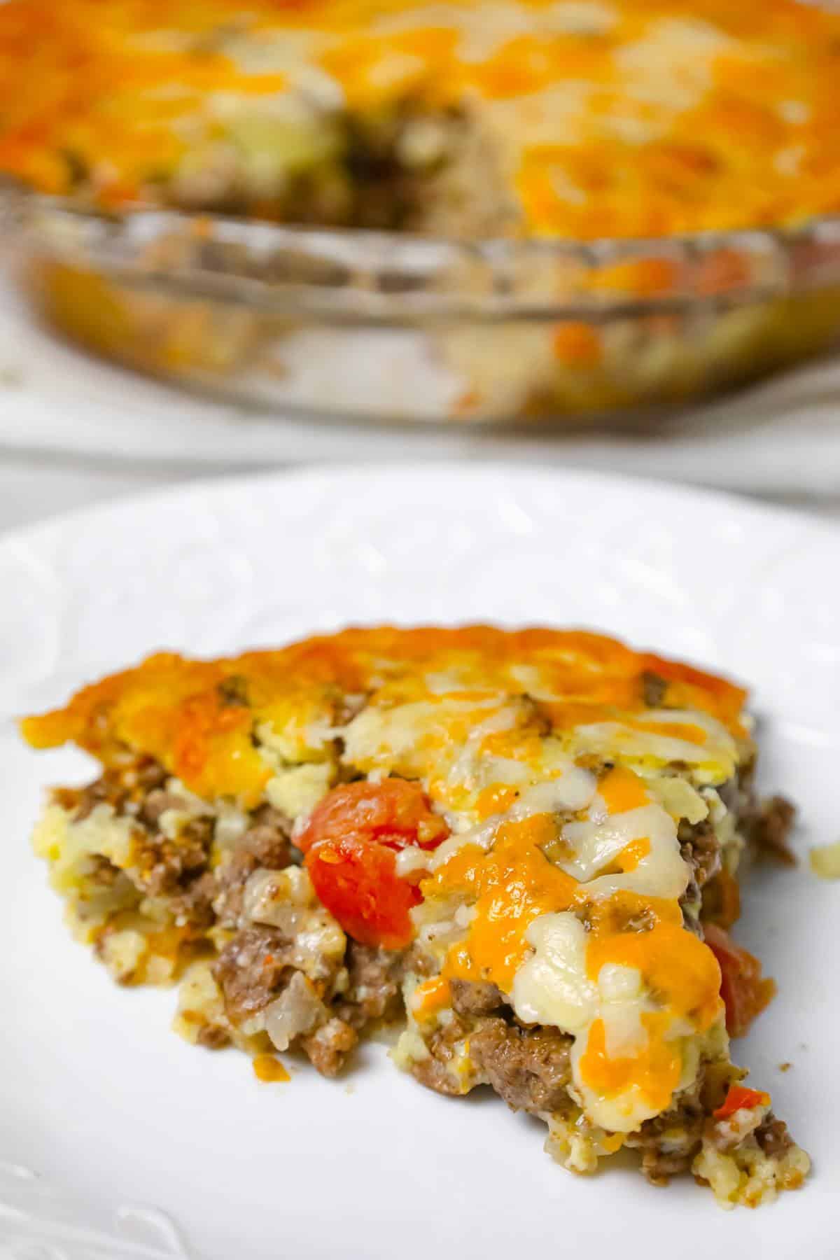 Cheeseburger Pie with Bisquick is an easy ground beef dinner recipe loaded with shredded cheese, diced onions and diced tomatoes.