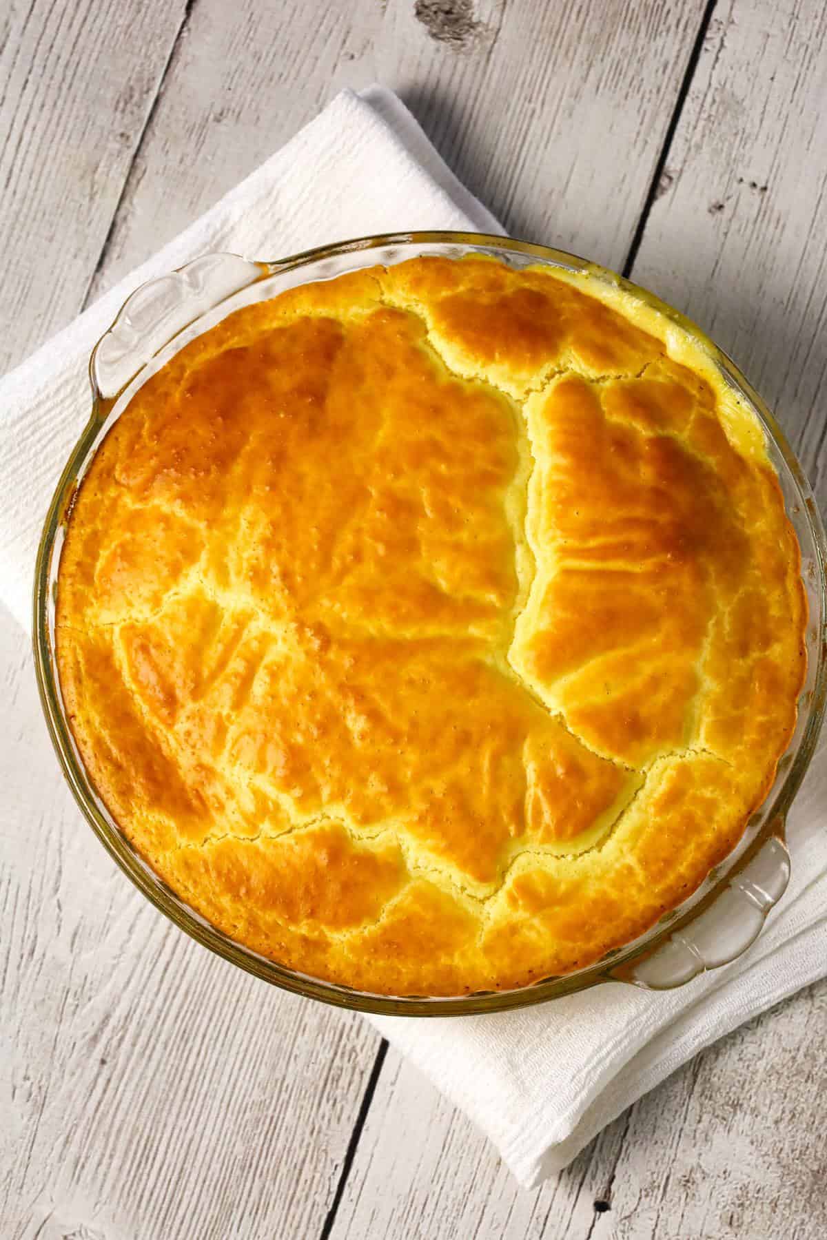 Chicken Pot Pie with Bisquick is an easy dinner recipe using precooked chicken, frozen mixed veggies and cream of chicken soup all topped with Bisquick.