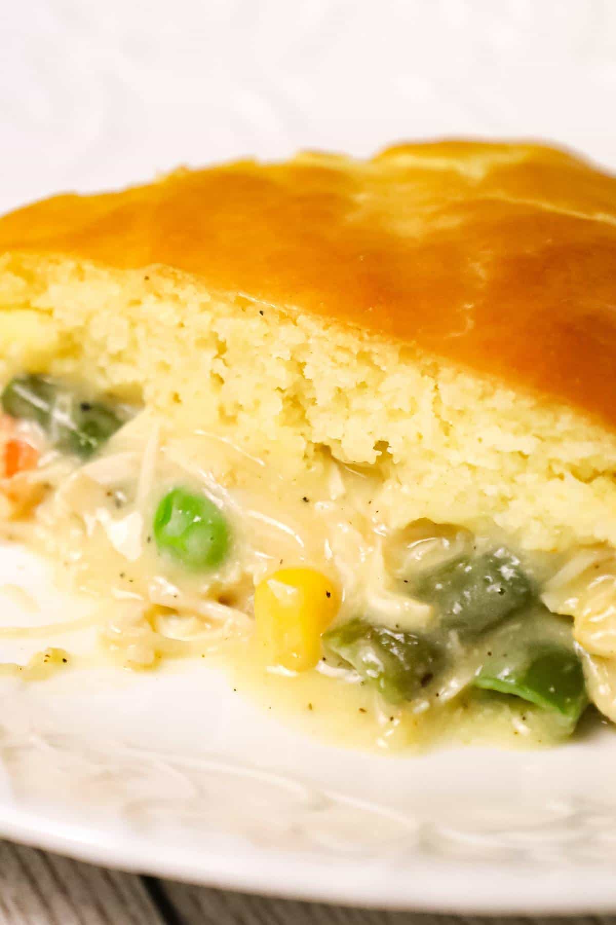 Chicken Pot Pie with Bisquick is an easy dinner recipe using precooked chicken, frozen mixed veggies and cream of chicken soup all topped with Bisquick.
