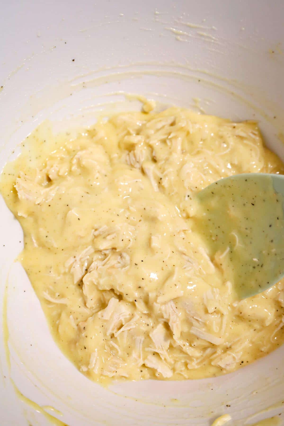 creamy chicken mixture in a mixing bowl