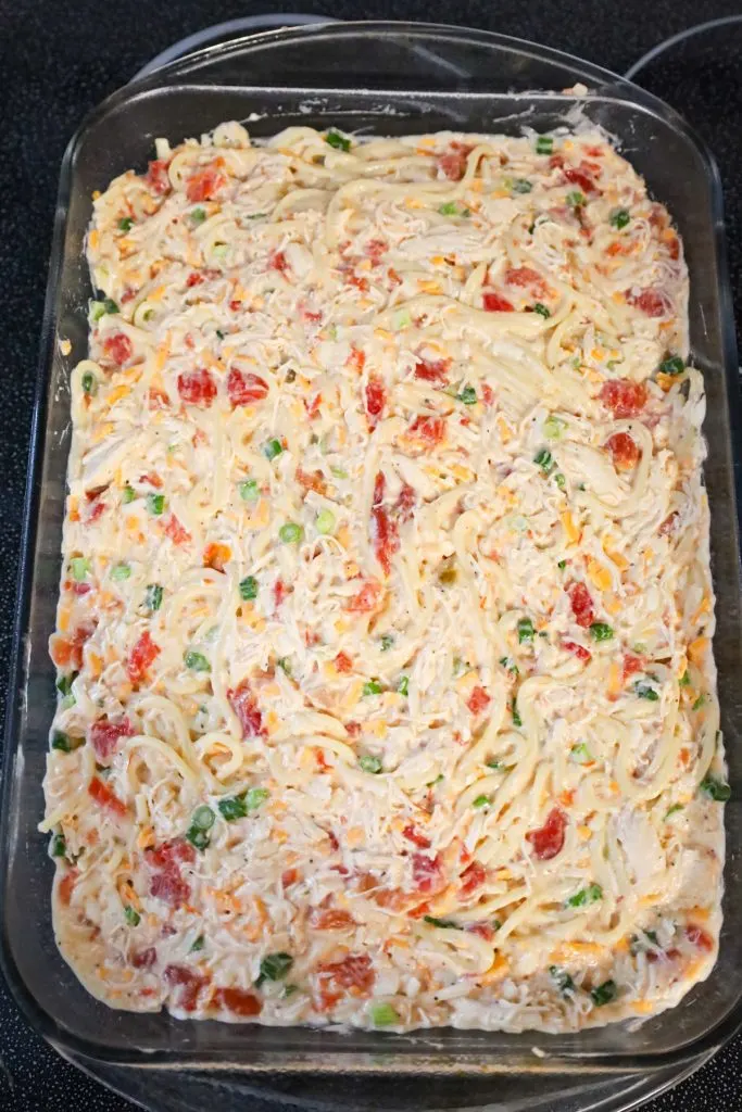 chicken spaghetti with rotel in a baking dish