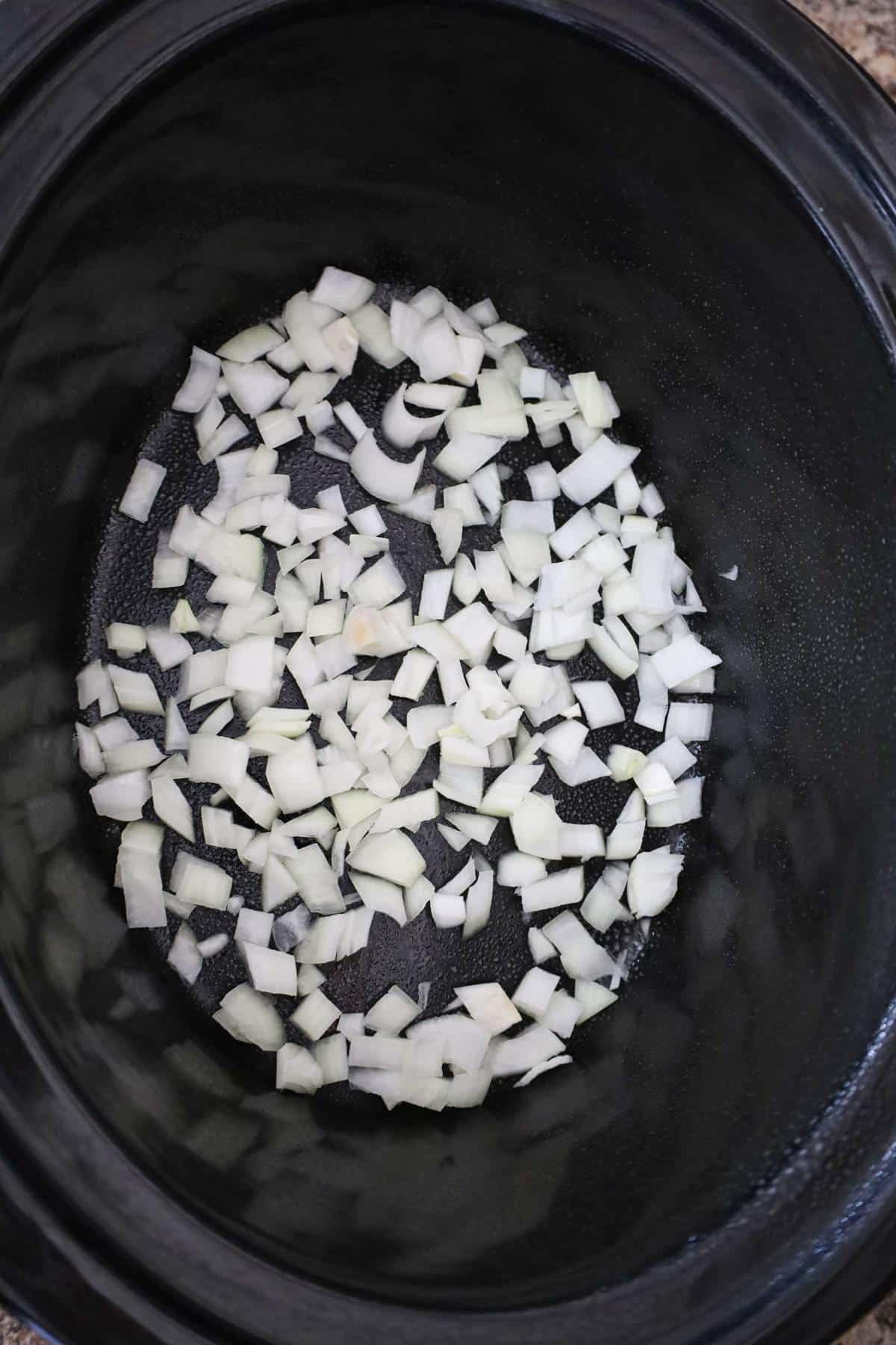diced onions in a Crock Pot