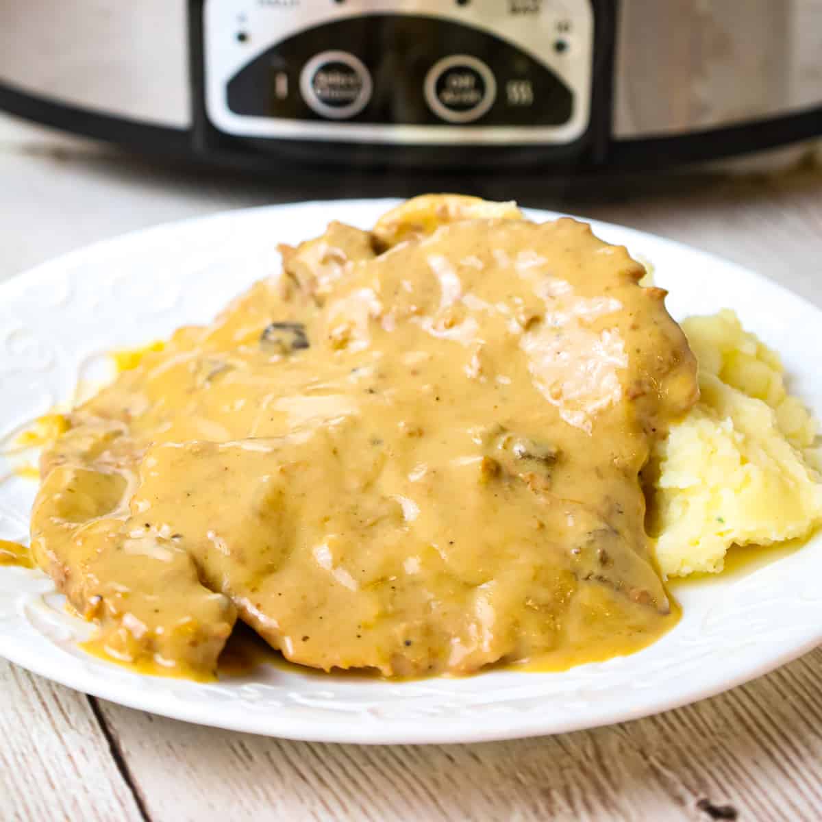 Crock Pot Cube Steak is an easy dinner recipe of tenderized steak cooked in a creamy mushroom gravy sauce.