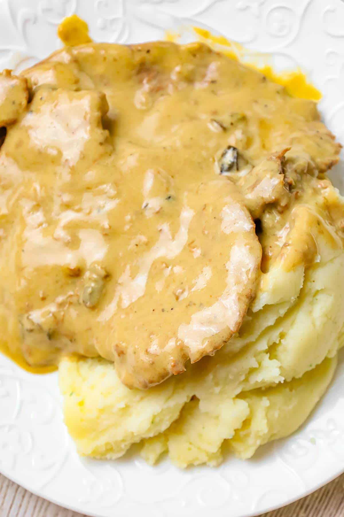 Crock Pot Cube Steak is an easy dinner recipe of tenderized steak cooked in a creamy mushroom gravy sauce.