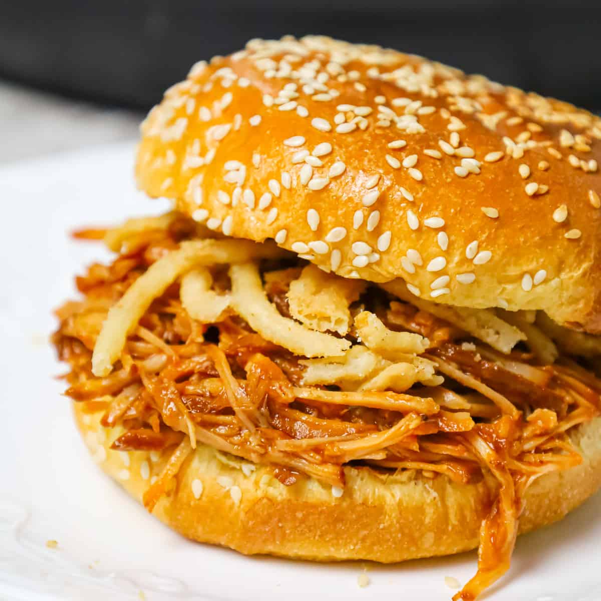 Instant Pot Pulled Pork is an easy and delicious dinner made with a boneless pork roast pressure cooked in apple juice and BBQ sauce.