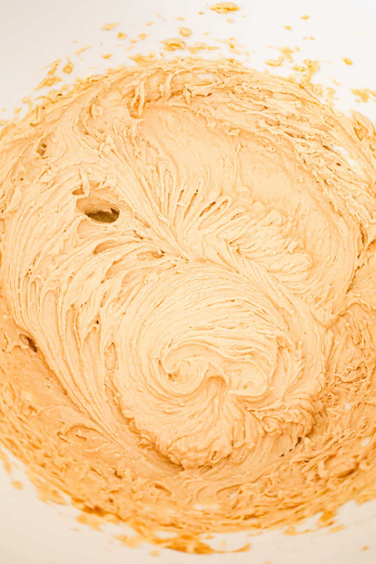 creamy peanut butter mixture in a mixing bowl