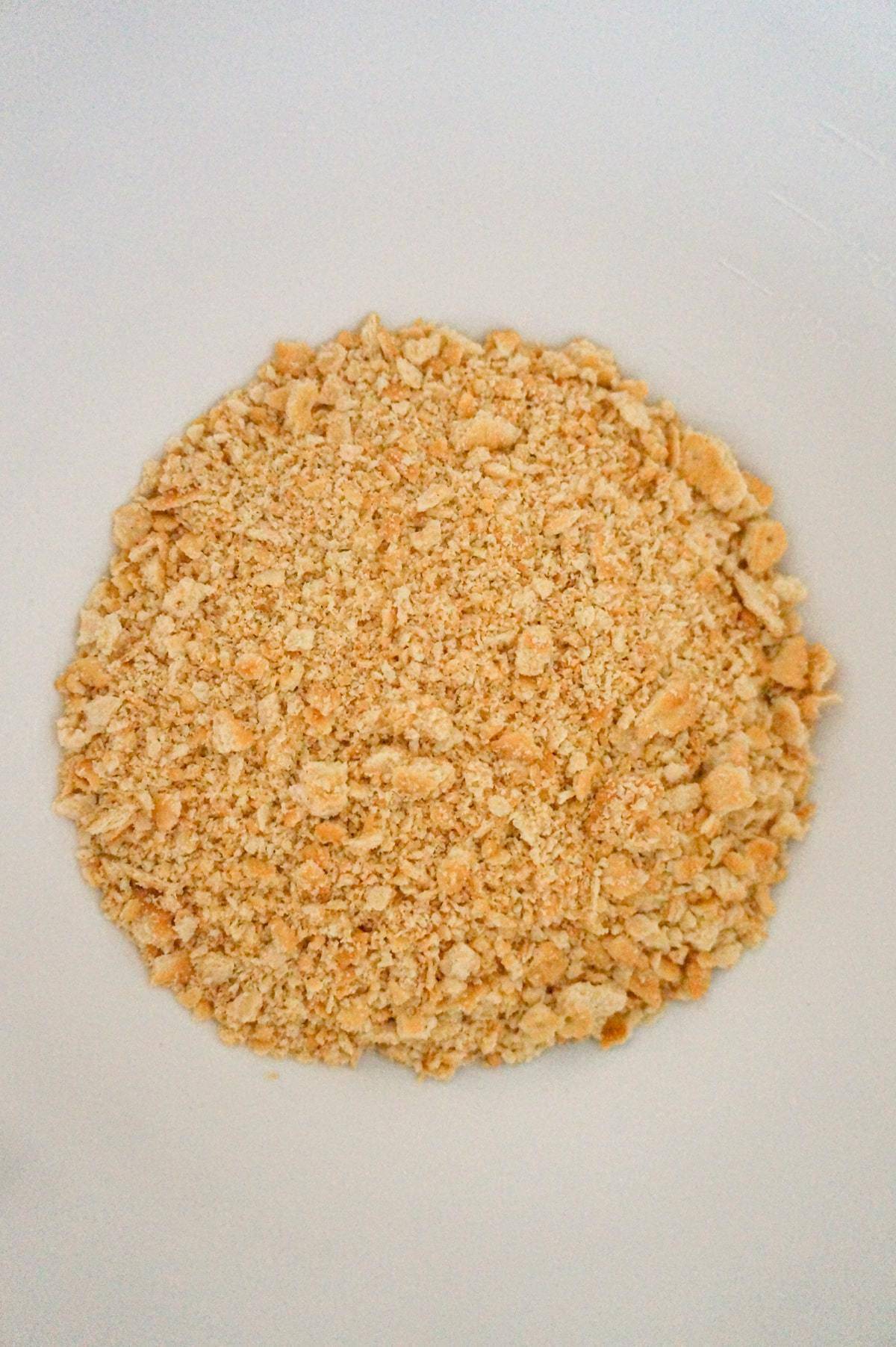 Ritz cracker crumbs in a mixing bowl