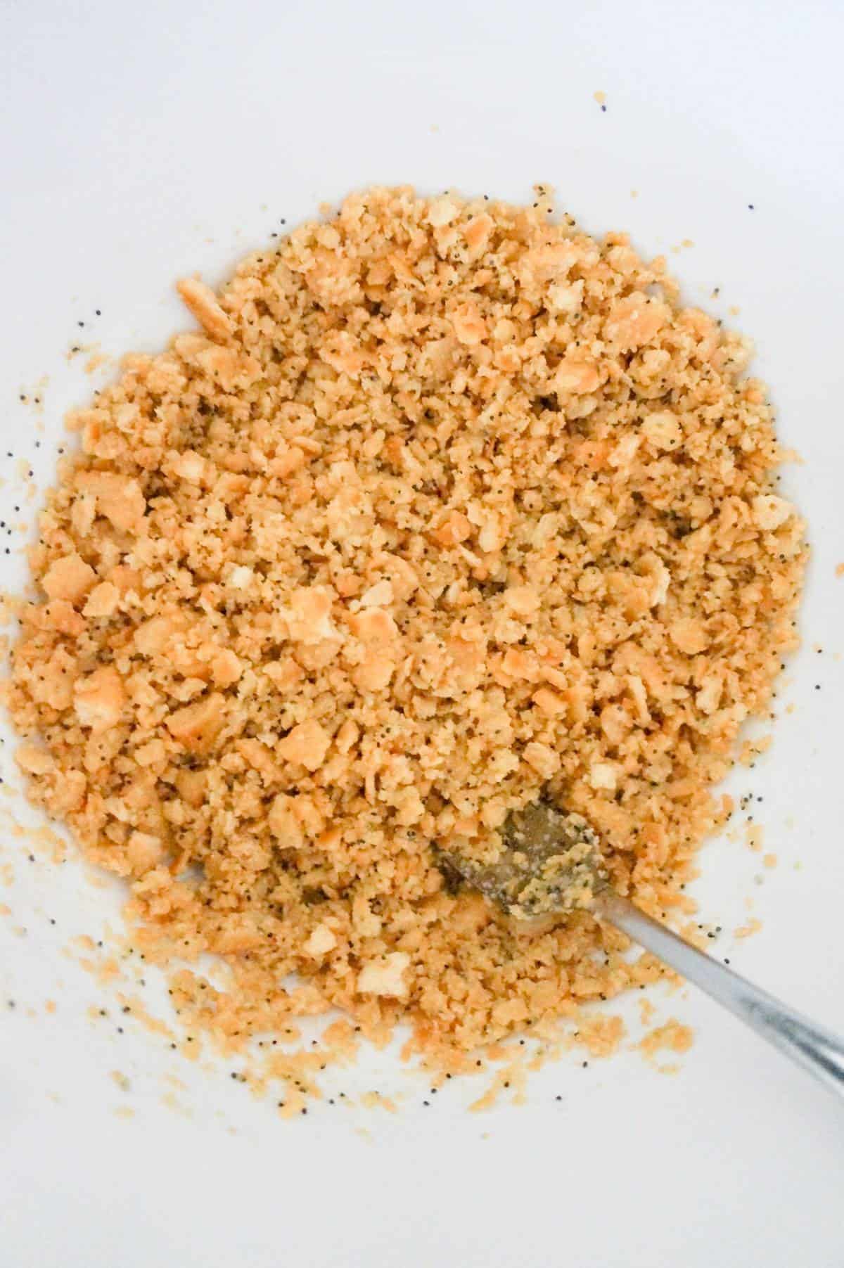 crumbled Ritz cracker mixture in a mixing bowl