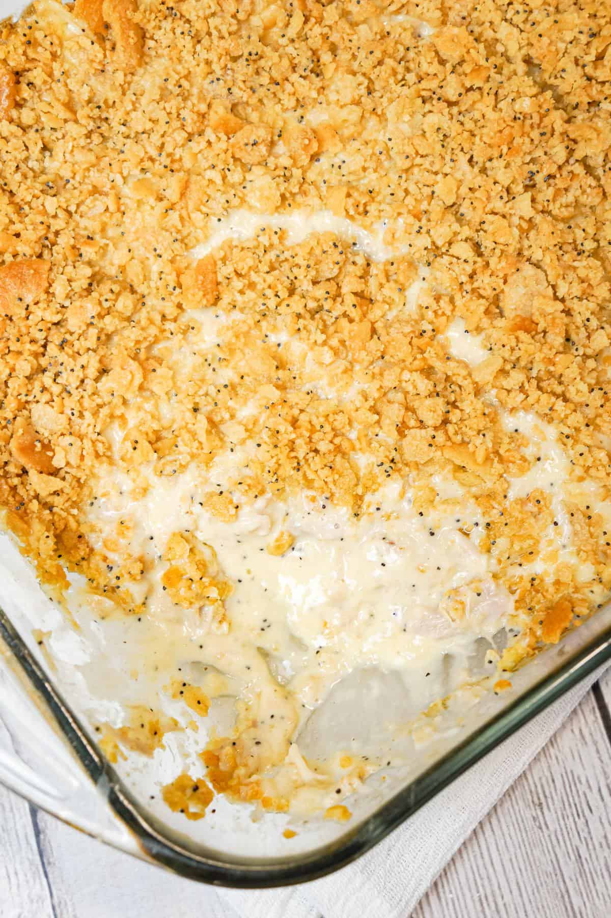 Poppy Seed Chicken Casserole is an easy dinner recipe loaded with shredded chicken, cream of chicken soup, shredded cheese and poppy seeds and topped with crumbled Ritz crackers.