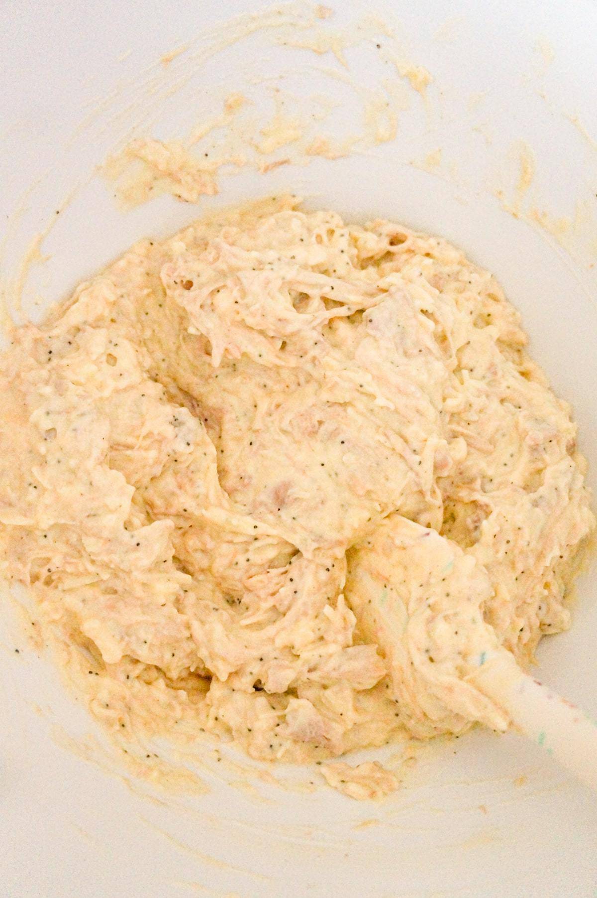 creamy chicken mixture in a mixing bowl