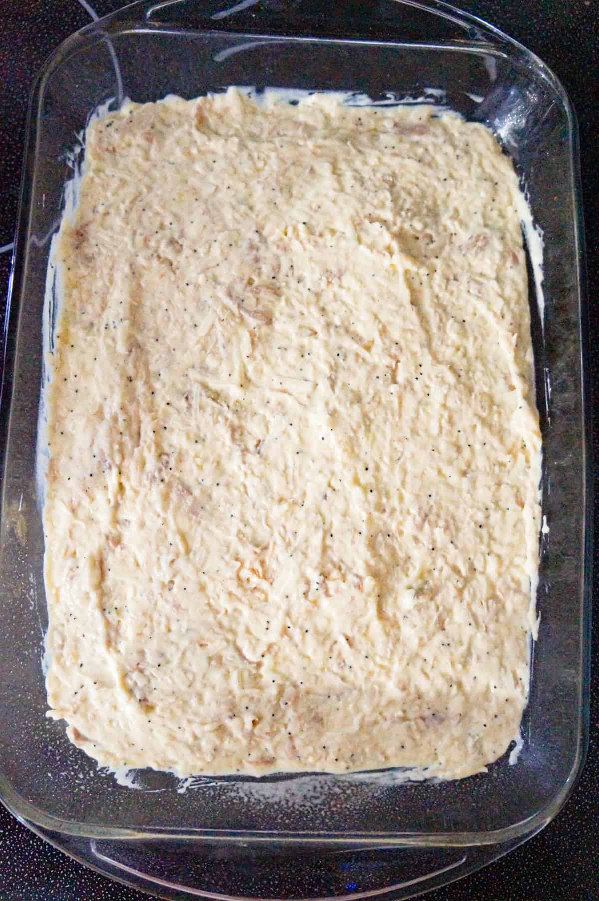 creamy chicken mixture in a baking dish