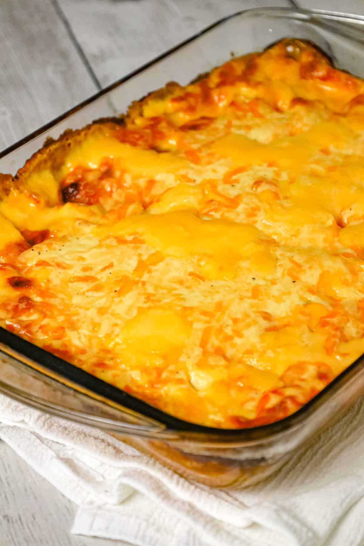 Southern Baked Mac and Cheese is a hearty dinner or side dish recipe loaded with cheddar cheese, Monterey jack and Velveeta.