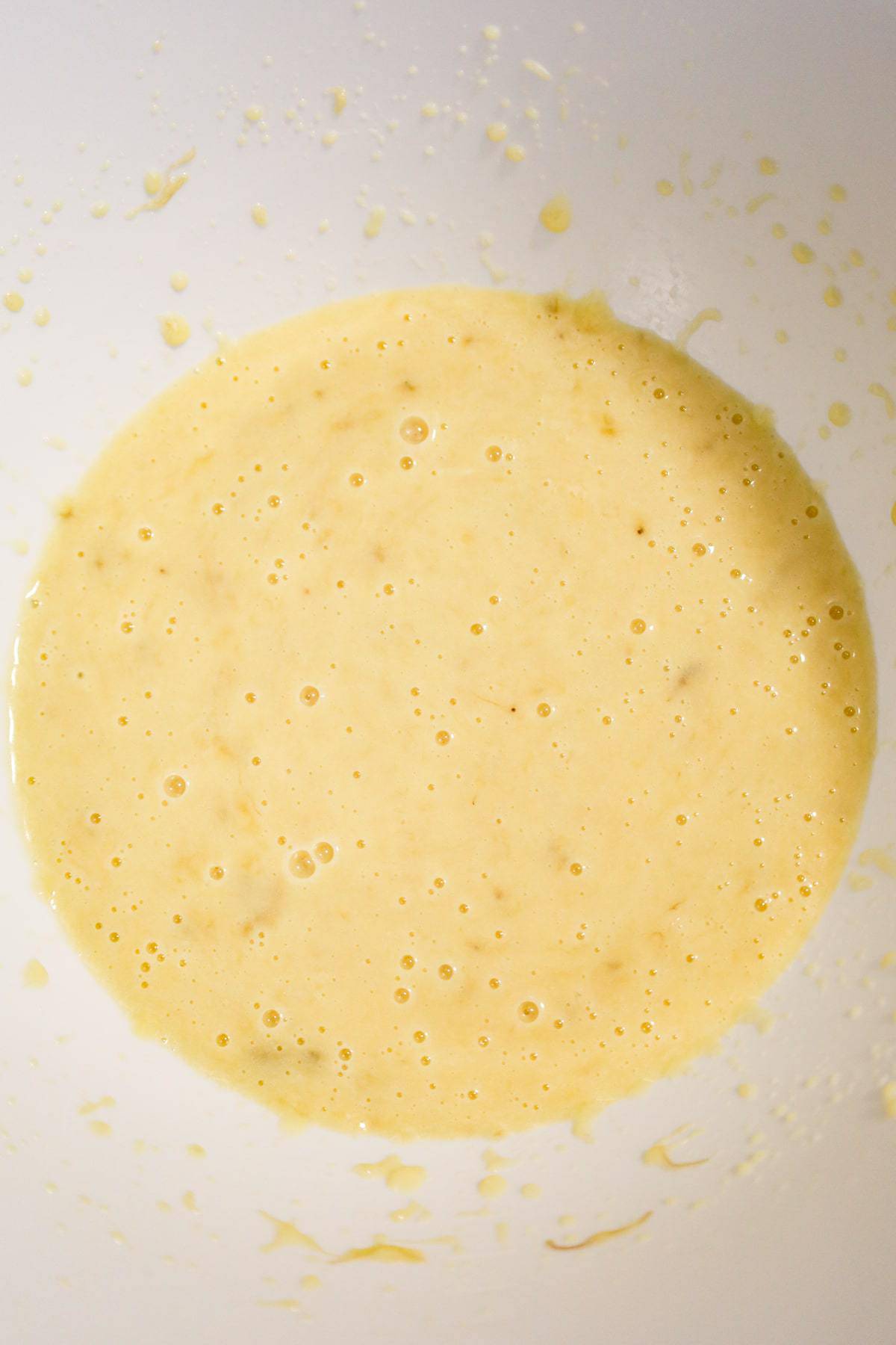 creamy banana mixture in a mixing bowl