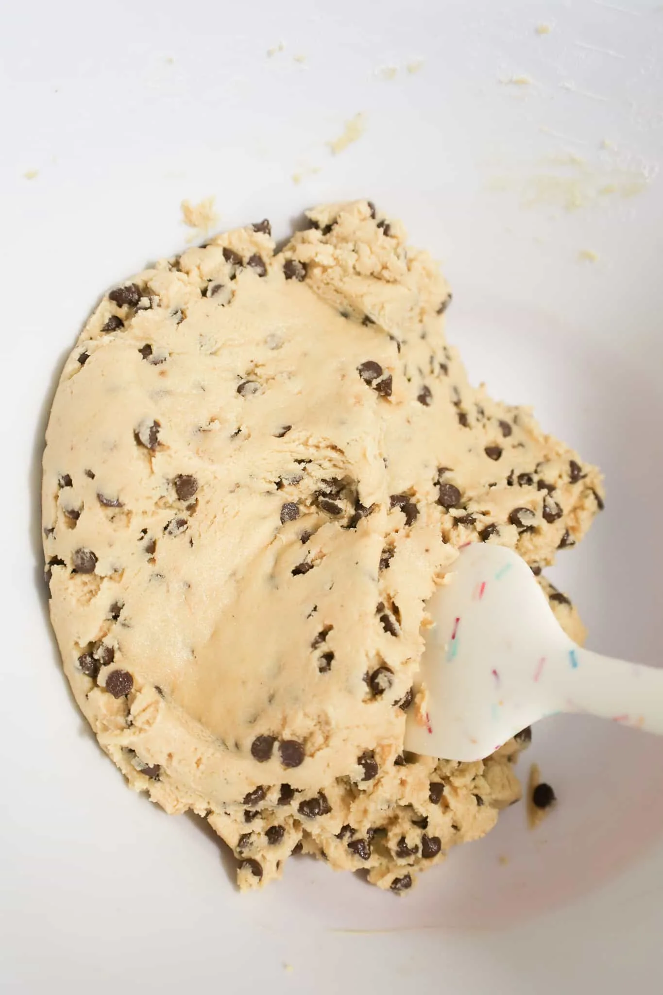 chocolate chip cookie dough in a mixing bowl
