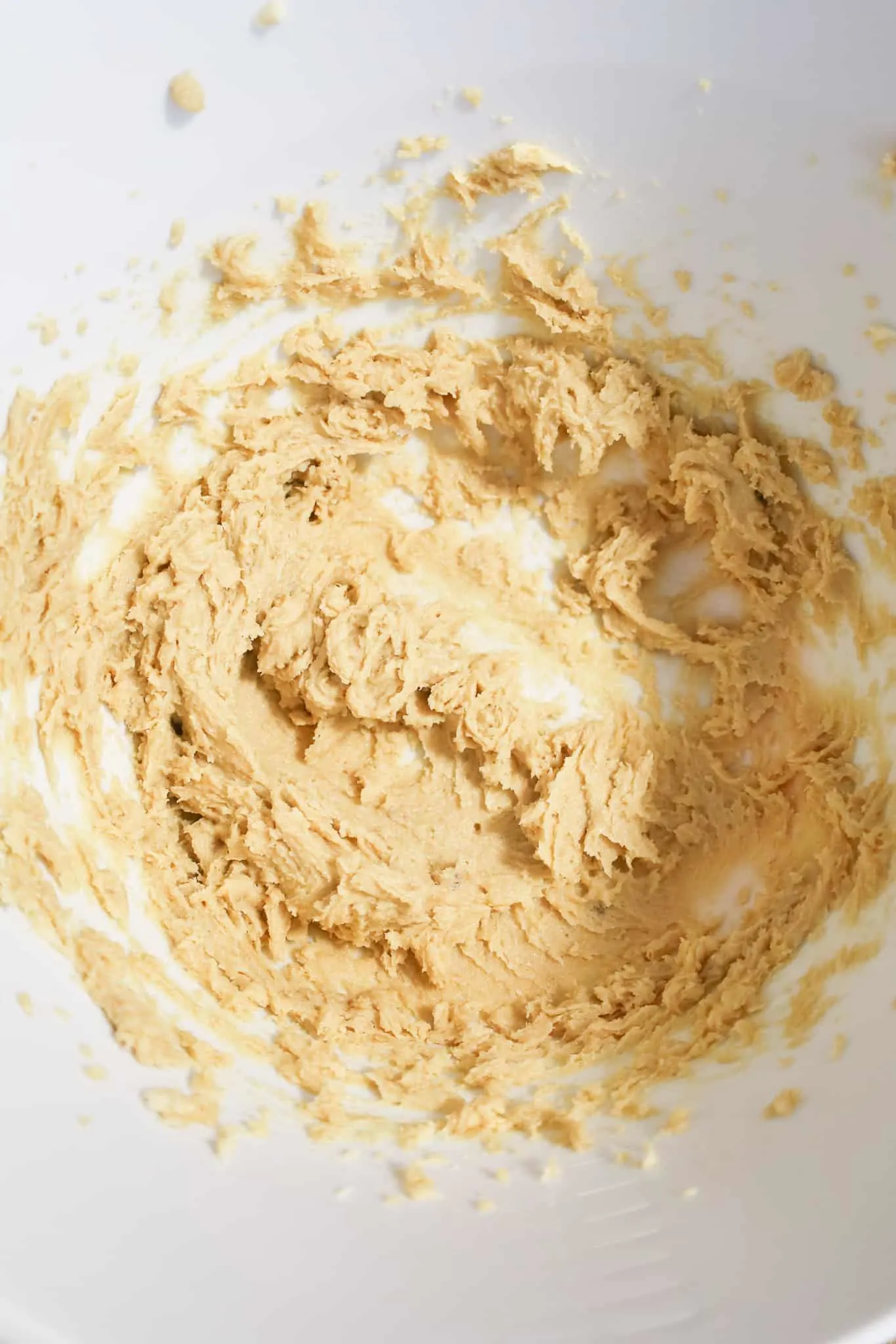 creamed butter and brown sugar mixture in a mixing bowl