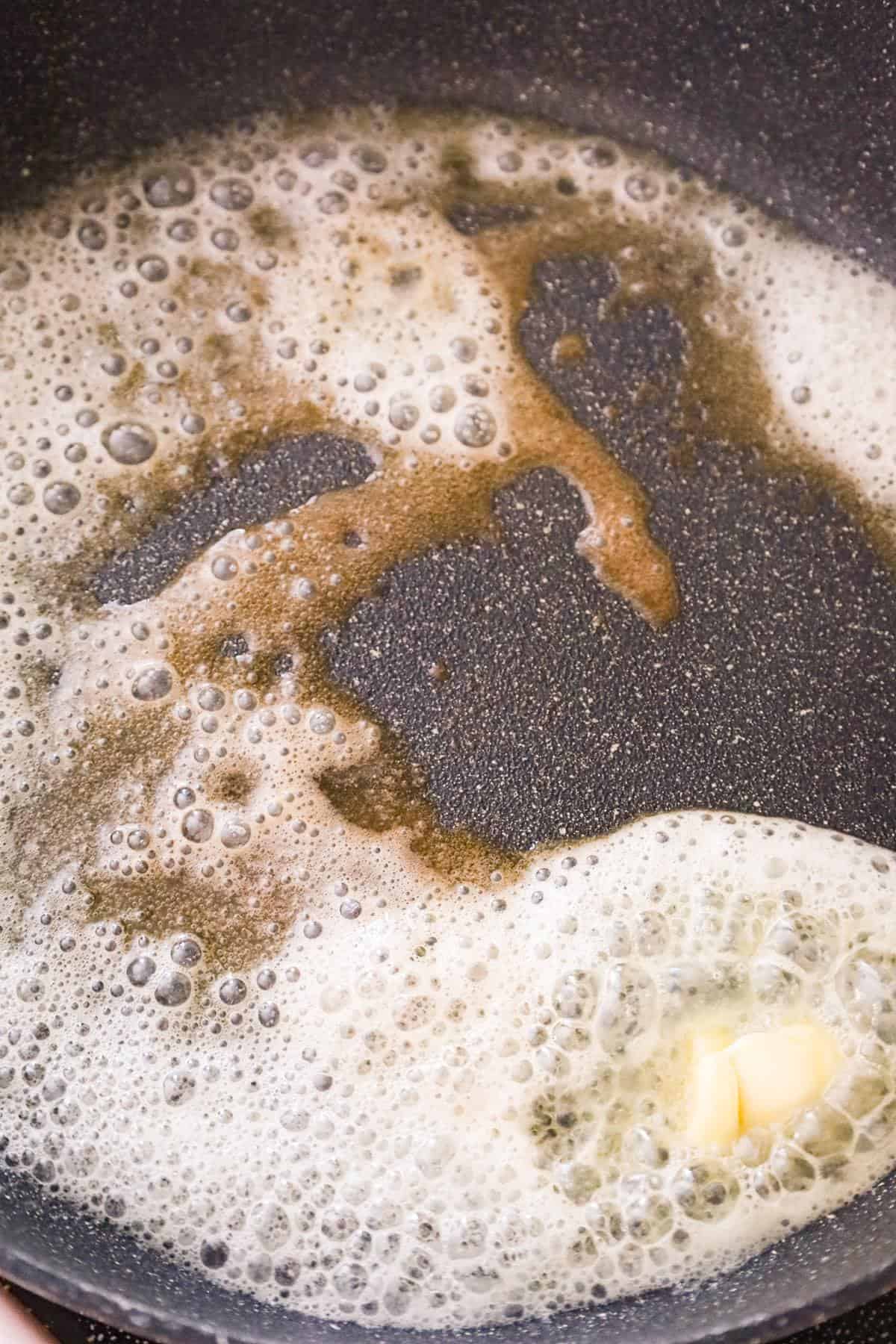 melted butter in saute pan