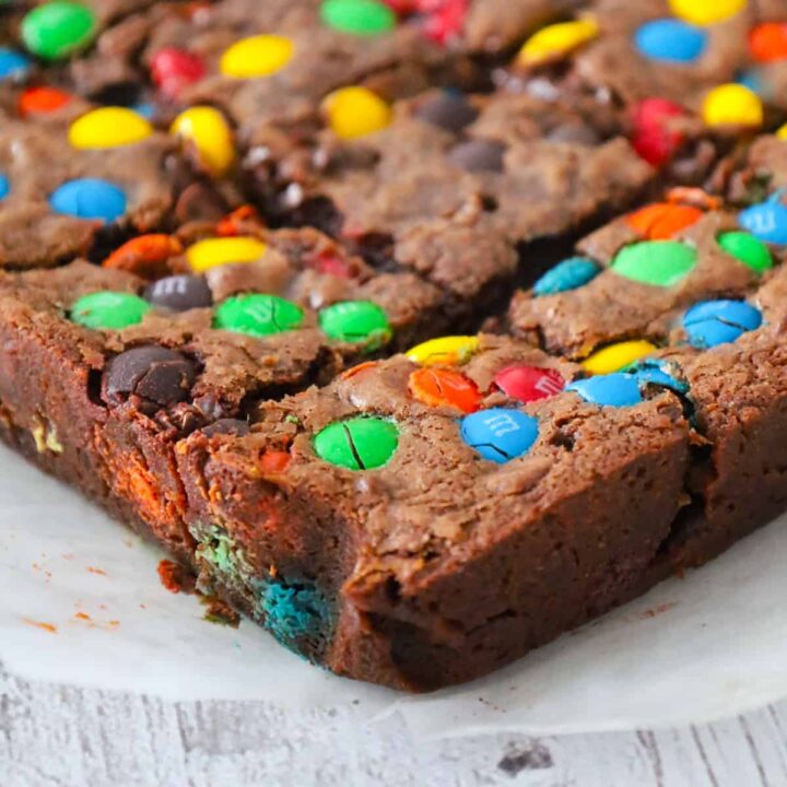 M&M Brownies are delicious fudgy brownies loaded with semi sweet chocolate chips and M&M's candies.