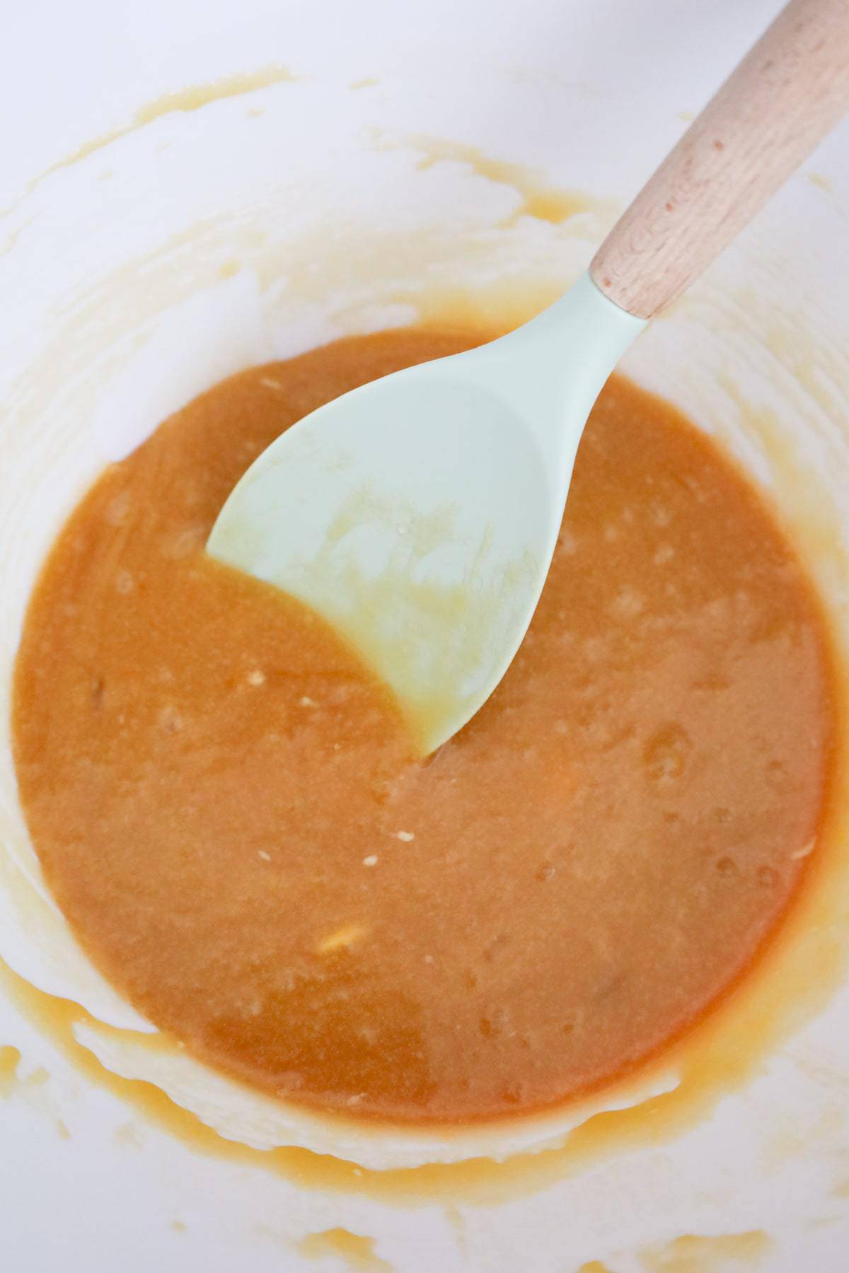 brown sugar, egg and melted butter mixture in a mixing bowl