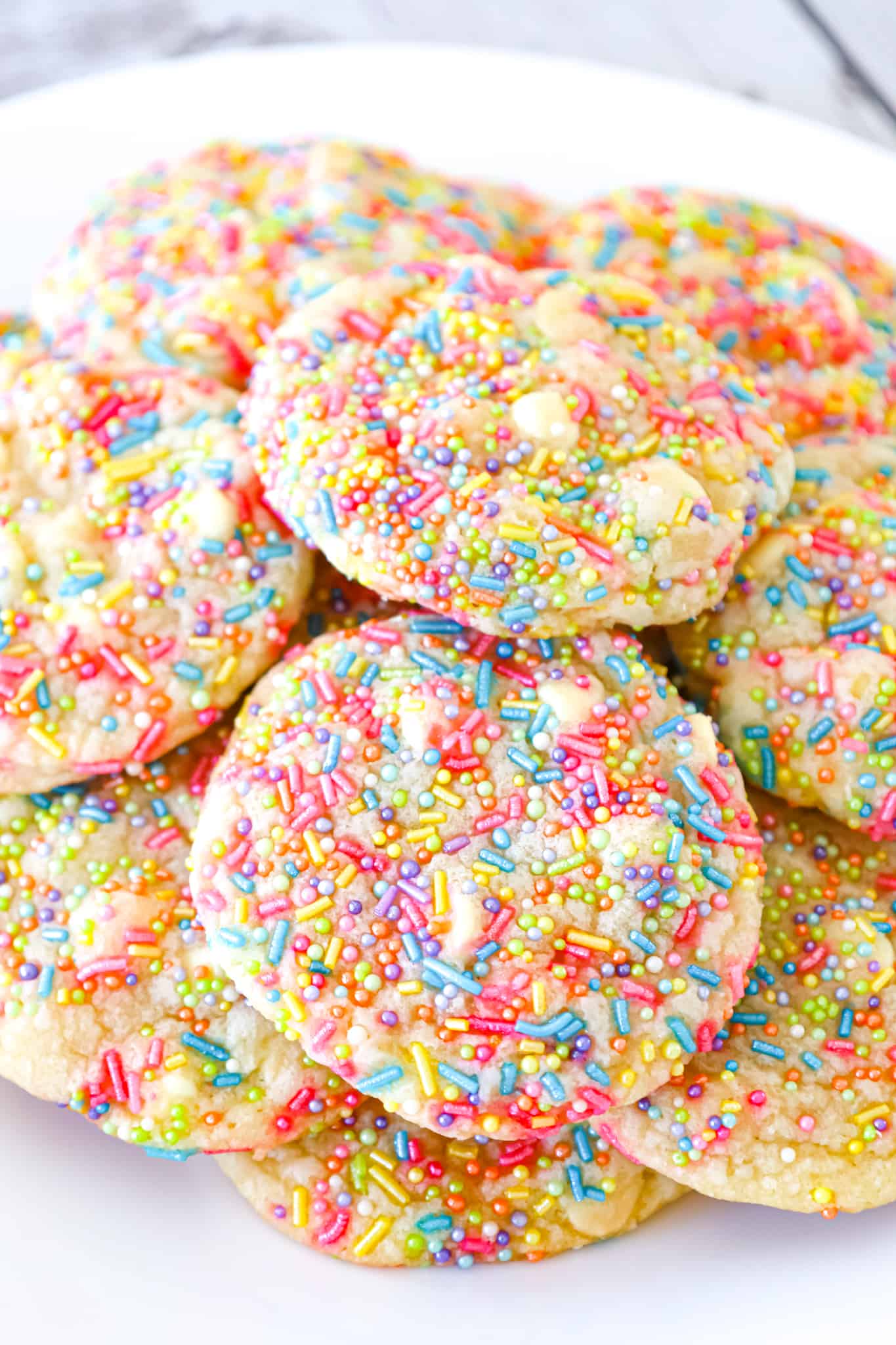 Funfetti Cookies are delicious soft and chewy cookies loaded with white chocolate chips and tons of colourful sprinkles.