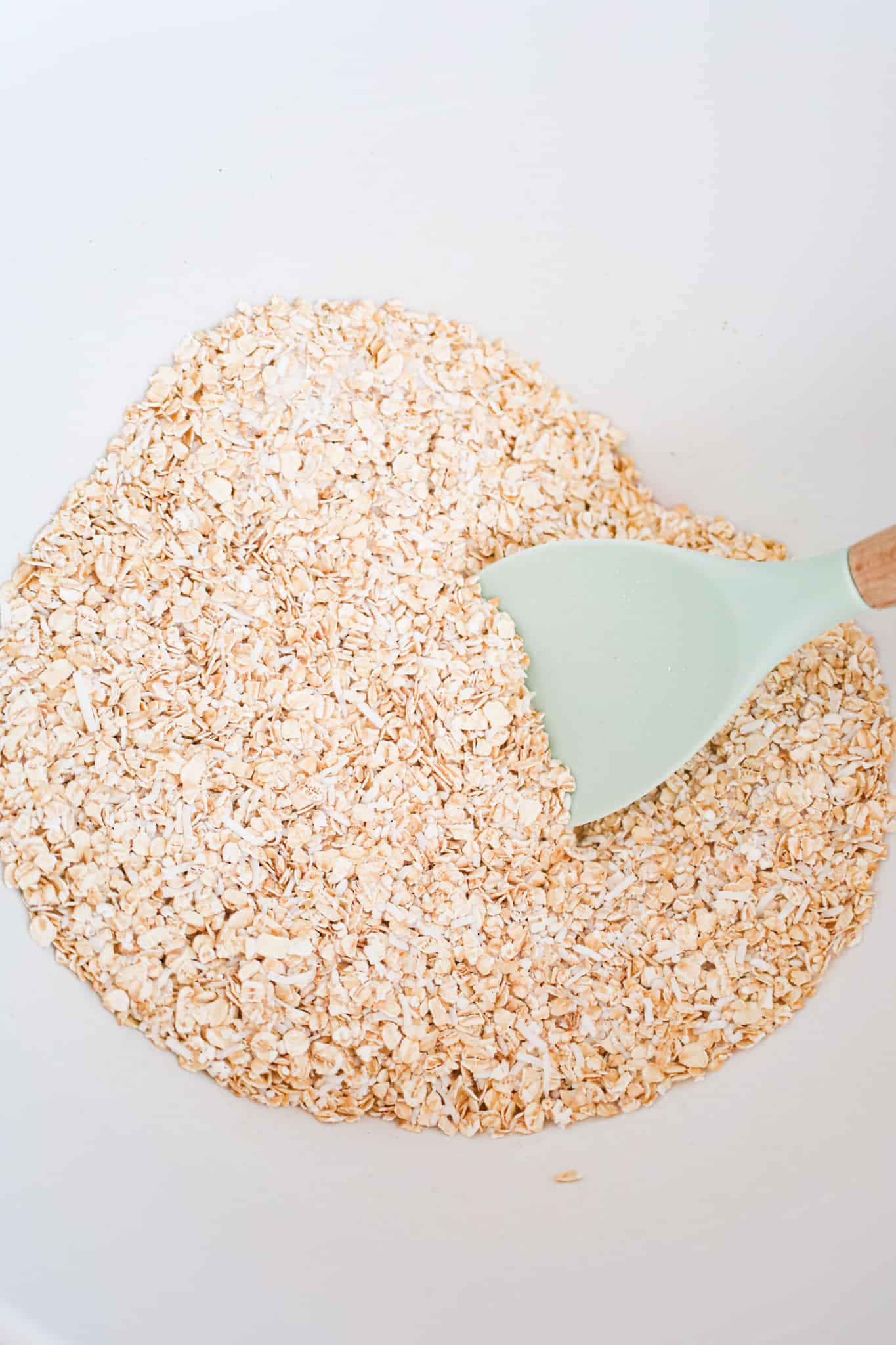 oats and shredded coconut mixed together in a bowl