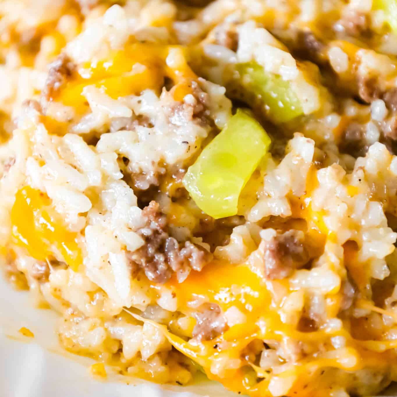 Instant Pot Big Mac Ground Beef and Rice is an easy pressure cooker dinner recipe made with long grain white rice and loaded with crumbled ground beef, diced dill pickles, mayo, Thousand Island dressing and shredded cheddar cheese.