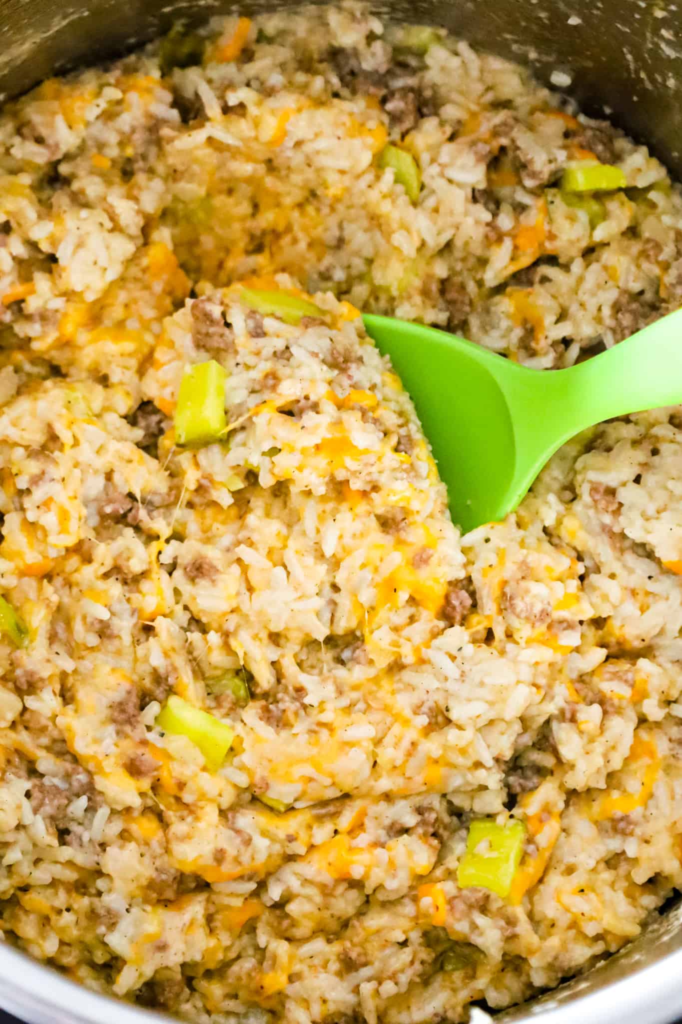 Instant Pot Big Mac Ground Beef and Rice is an easy pressure cooker dinner recipe made with long grain white rice and loaded with crumbled ground beef, diced dill pickles, mayo, Thousand Island dressing and shredded cheddar cheese.