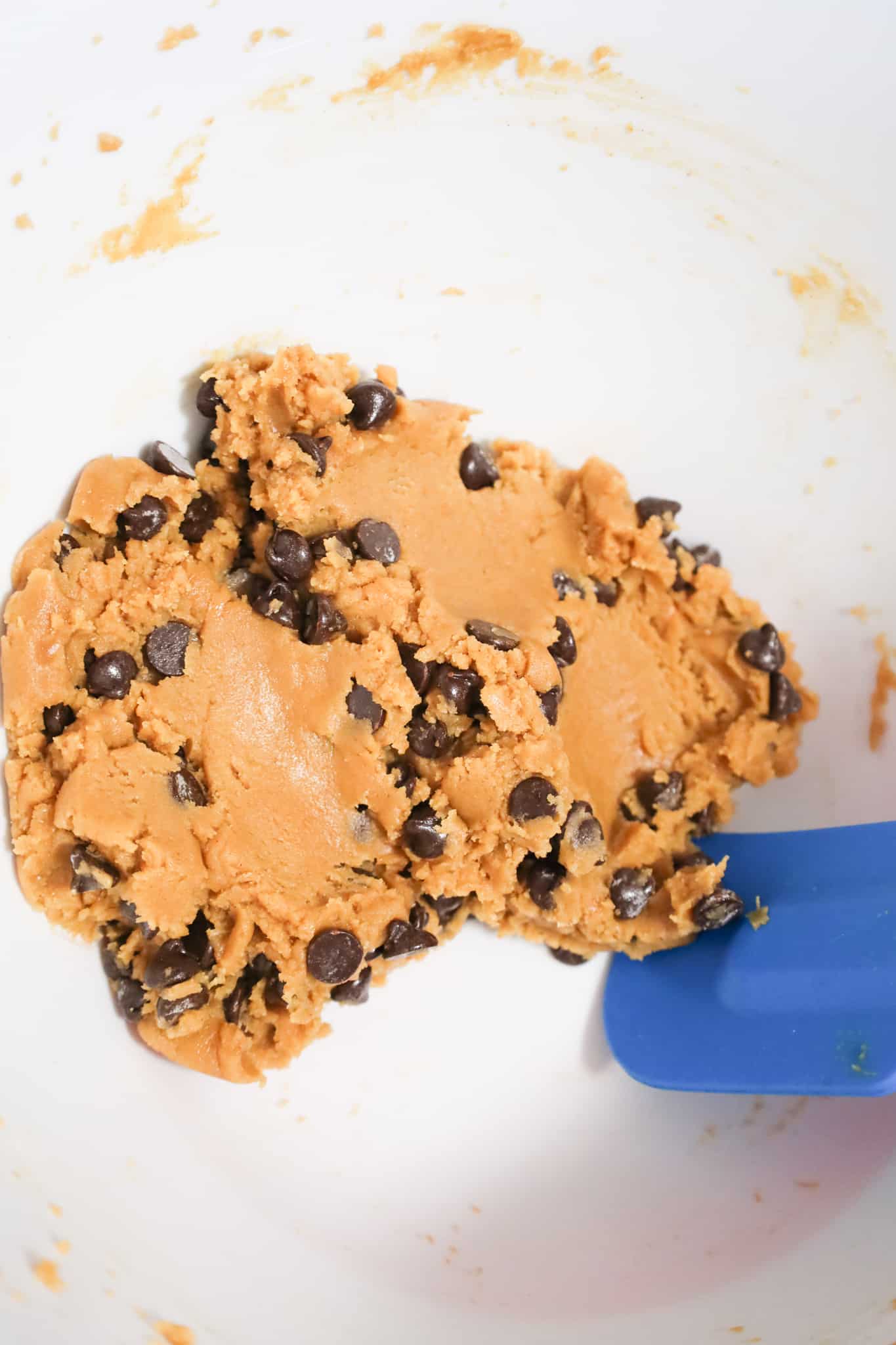 peanut butter chocolate chip cookie dough in a mixing bowl