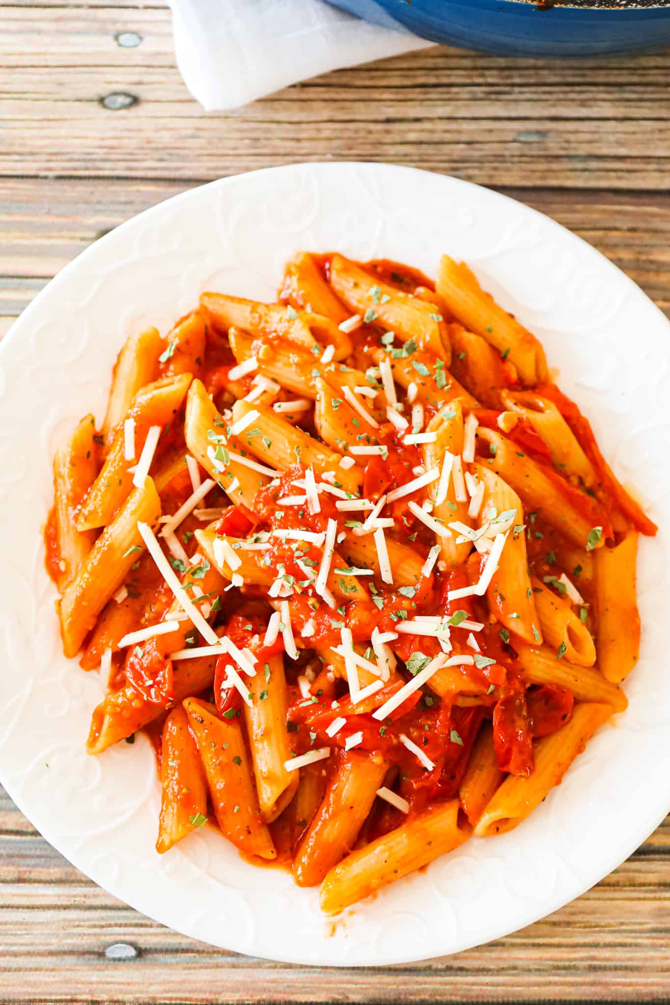 Penne Pomodoro is a delicious pasta recipe with a sauce made from fresh cherry tomatoes and basil pesto.