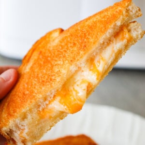 Air Fryer Grilled Cheese is an easy lunch or dinner recipe and results in a crispy sandwich with perfectly melted cheese.