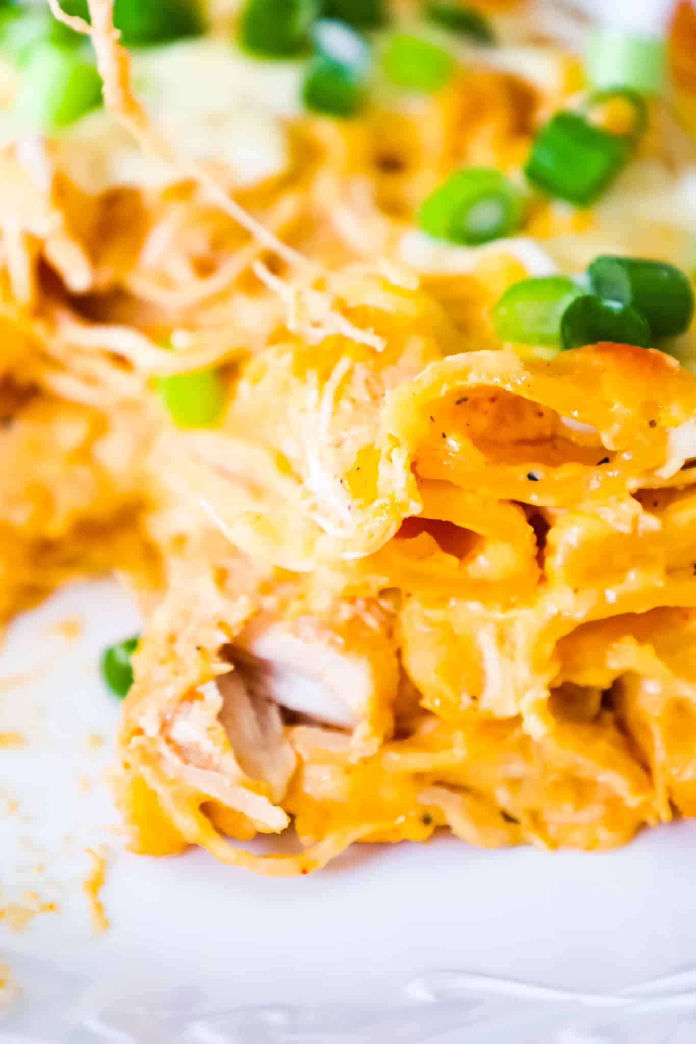 Buffalo Chicken Pasta Bake is a creamy baked penne pasta recipe loaded with shredded rotisserie chicken, cream cheese, Buffalo sauce, ranch dressing, parmesan cheese and mozzarella cheese.