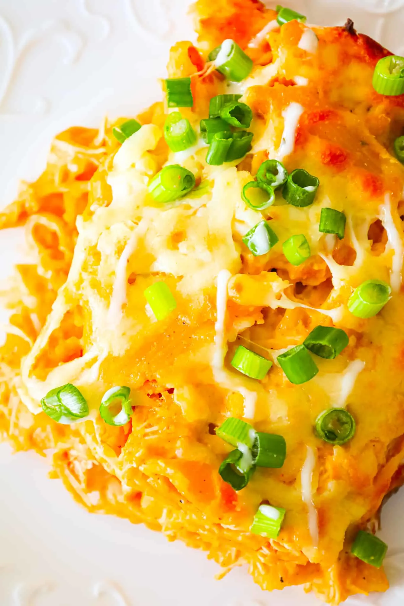 Buffalo Chicken Pasta Bake is a creamy baked penne pasta recipe loaded with shredded rotisserie chicken, cream cheese, Buffalo sauce, ranch dressing, parmesan cheese and mozzarella cheese.