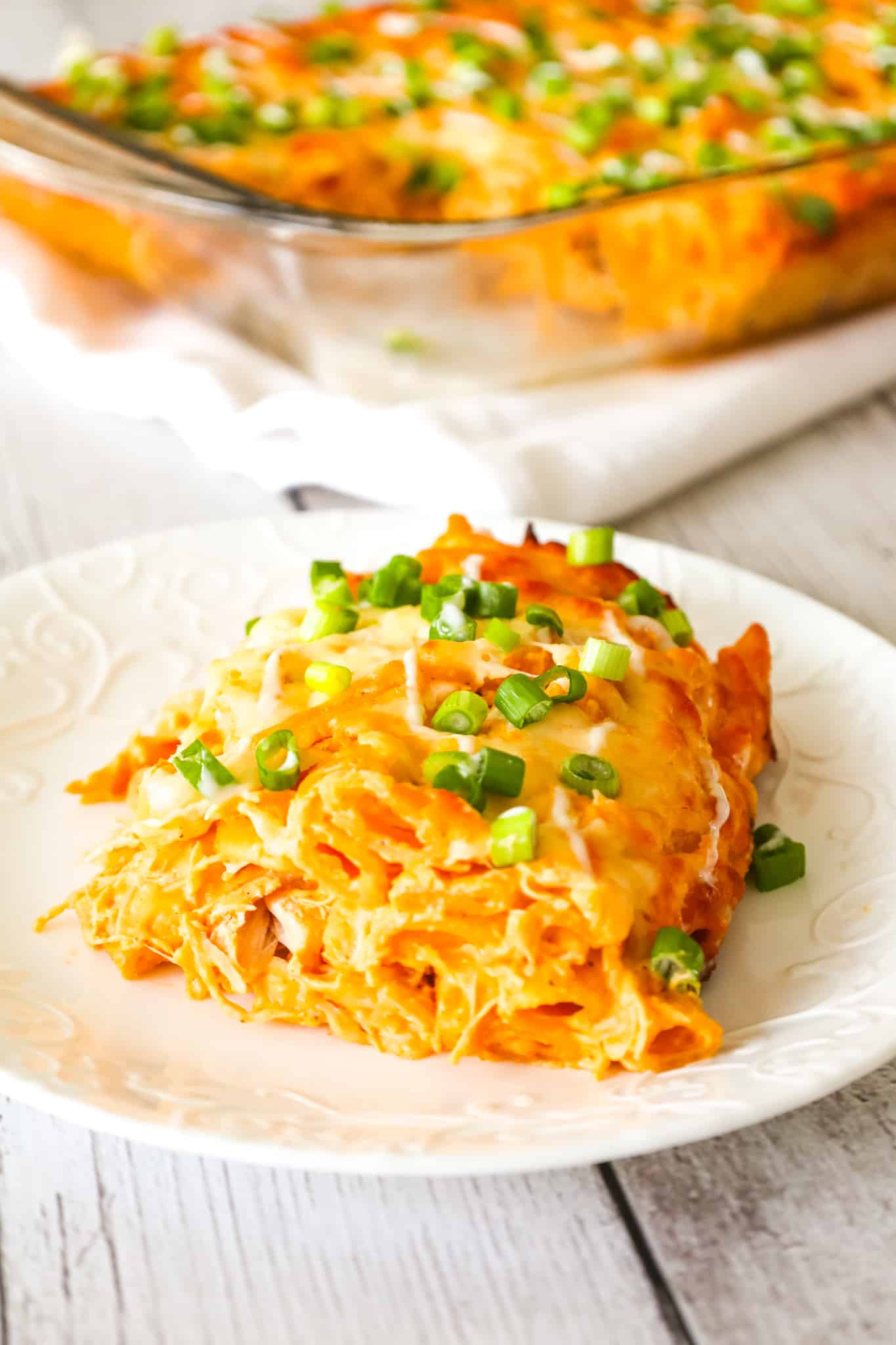 Buffalo Chicken Pasta Bake is a creamy baked penne pasta recipe loaded with shredded rotisserie chicken, cream cheese, Buffalo sauce, ranch dressing, parmesan cheese and mozzarella cheese.