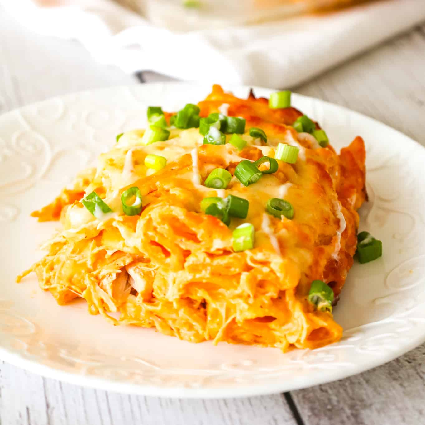 Buffalo Chicken Pasta Bake is a creamy baked penne pasta recipe loaded with shredded rotisserie chicken, cream cheese, Buffalo sauce, ranch dressing, parmesan cheese and mozzarella cheese.