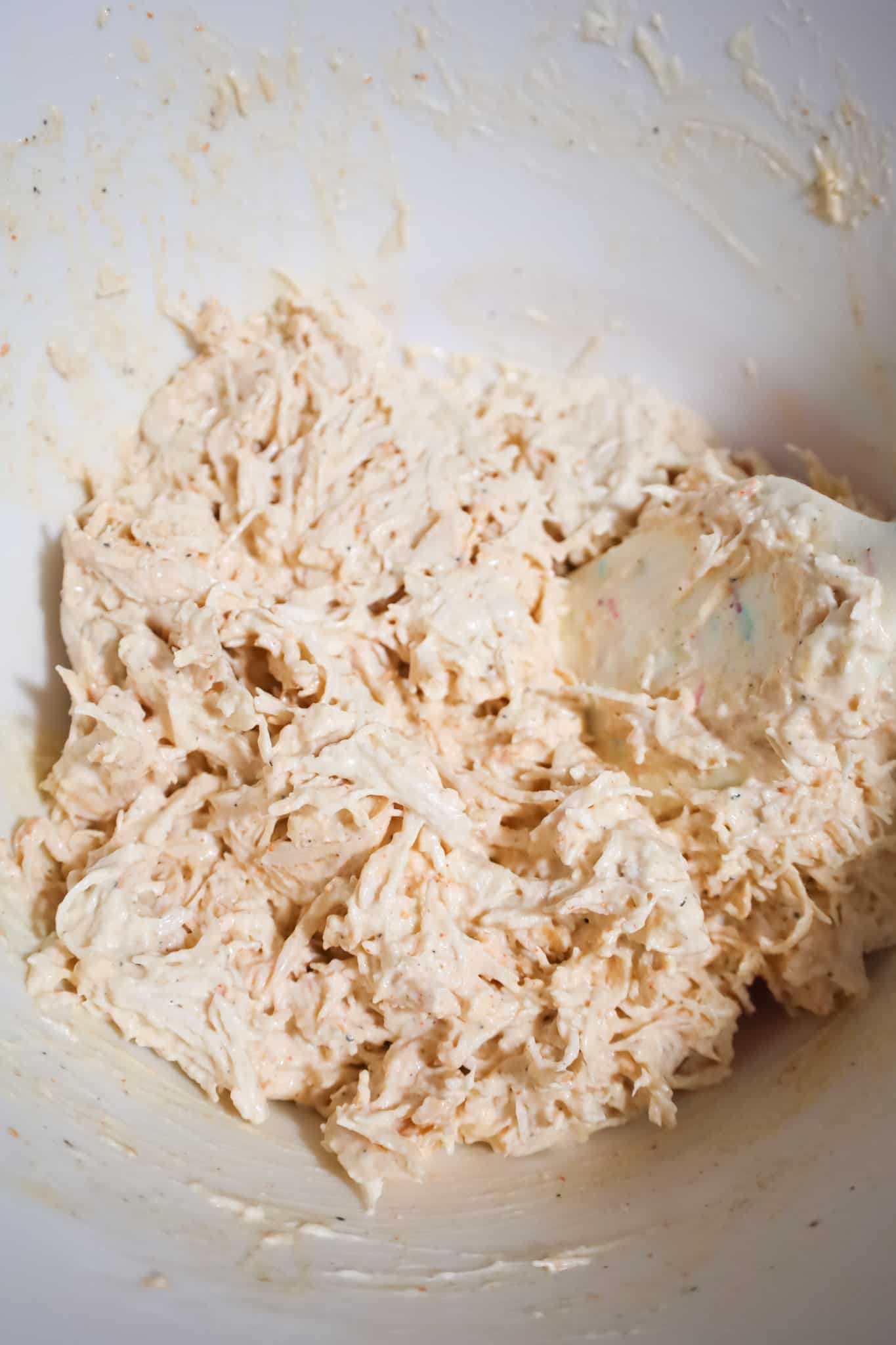 mayo and shredded mixture in a mixing bowl