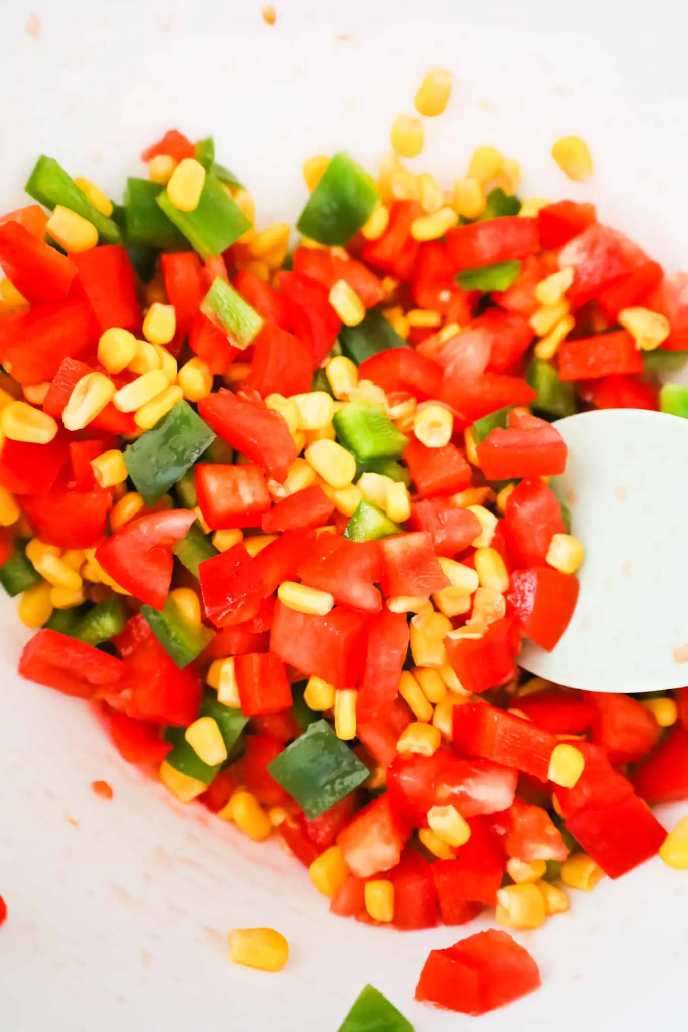 diced vegetable mixture in a mixing bowl